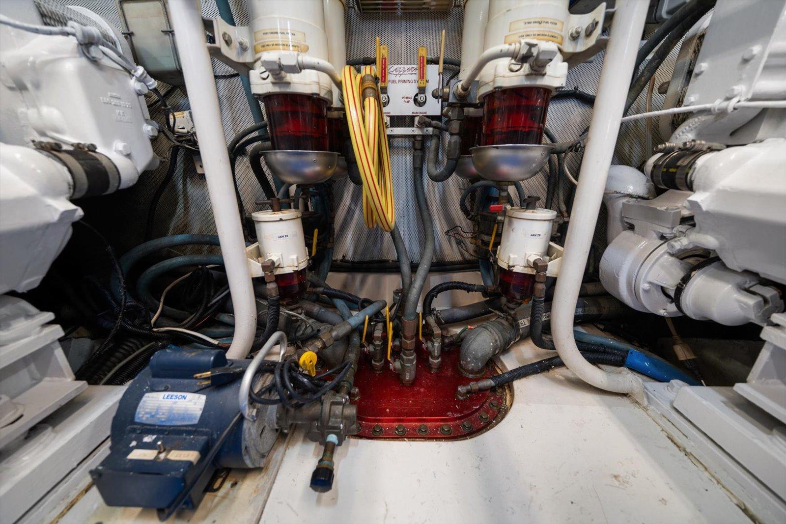 Lazzara-EB 76 1997-Octopi FL-US-Engine room of 1997 Lazzara EB 76 yacht, showcasing mechanical components and wiring.-9736767 | Thumbnail