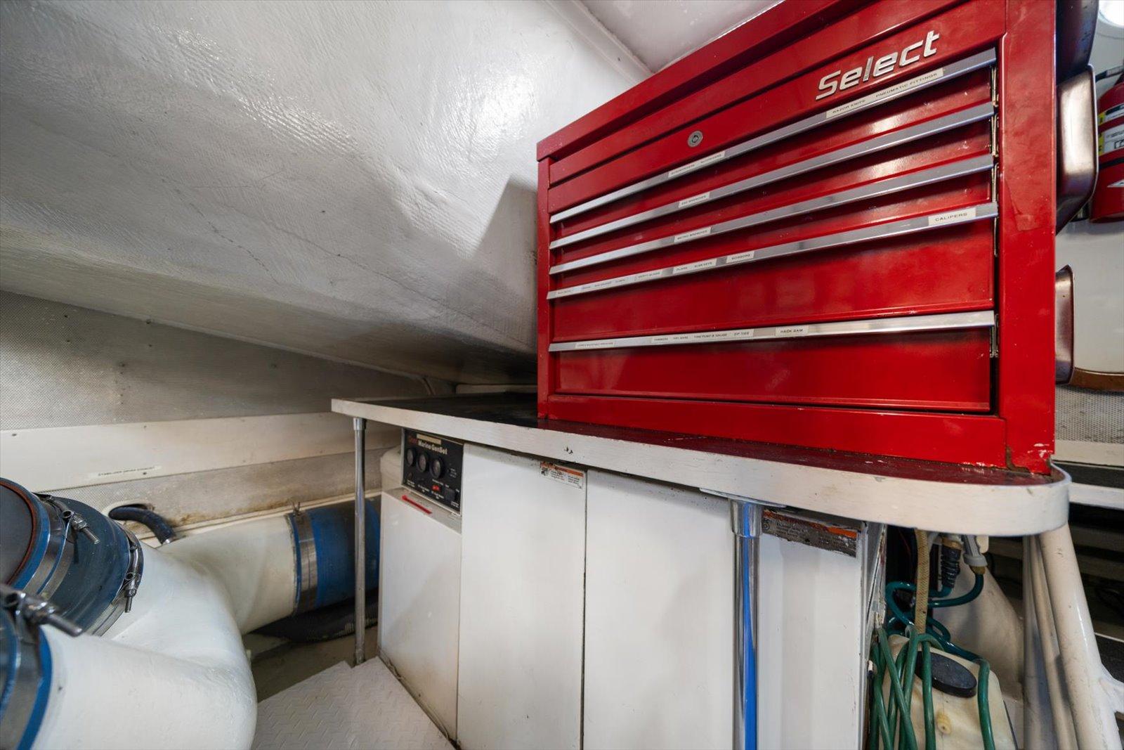 Lazzara-EB 76 1997-Octopi FL-US-Red tool chest in the engine room of a 1997 Lazzara EB 76 yacht.-9736767 | Thumbnail
