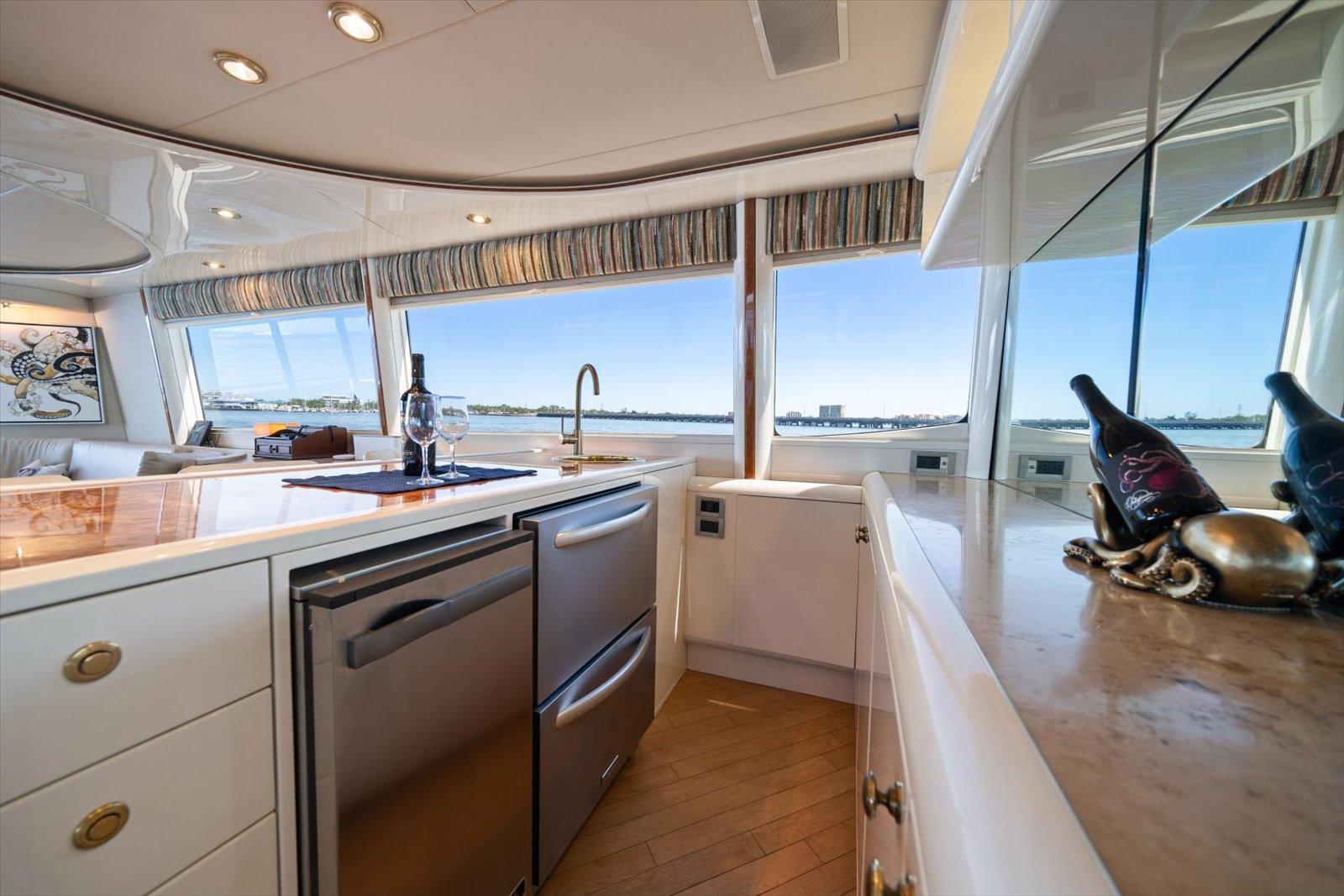 Lazzara-EB 76 1997-Octopi FL-US-Luxurious kitchen interior of 1997 Lazzara EB 76 yacht with ocean view.-9736767 | Thumbnail