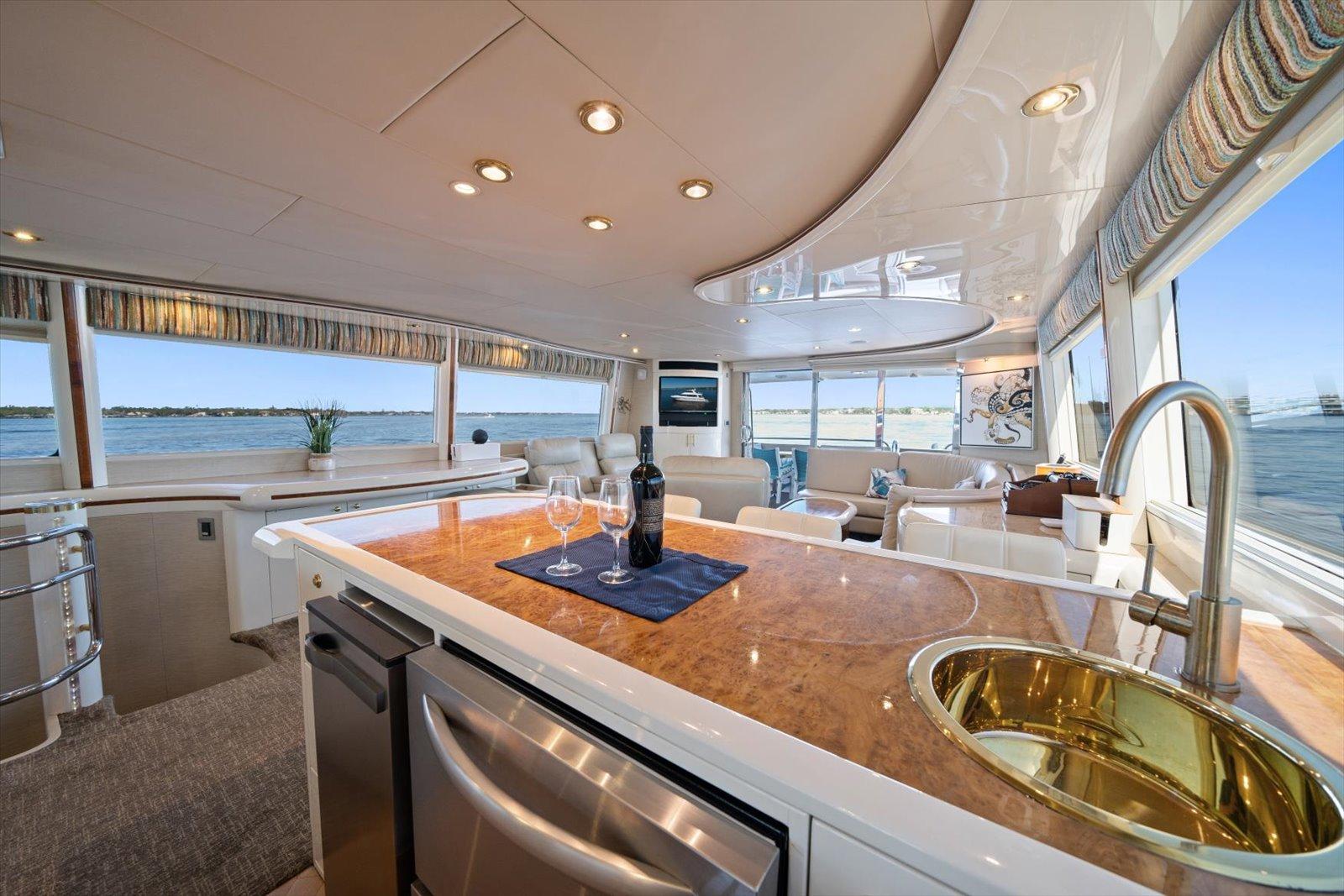 Lazzara-EB 76 1997-Octopi FL-US-Luxurious interior of 1997 Lazzara EB 76 yacht with modern kitchen and scenic ocean views.-9736767 | Thumbnail