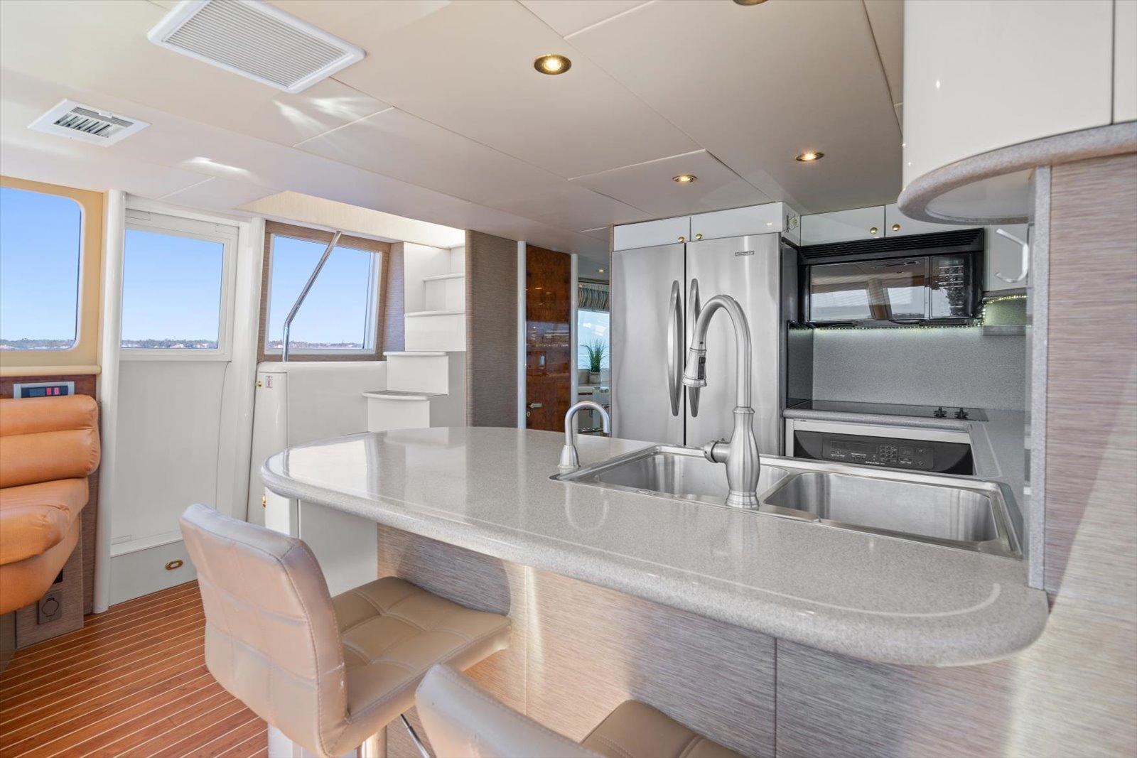 Lazzara-EB 76 1997-Octopi FL-US-Luxurious kitchen interior of 1997 Lazzara EB 76 yacht with modern appliances and seating.-9736767 | Thumbnail