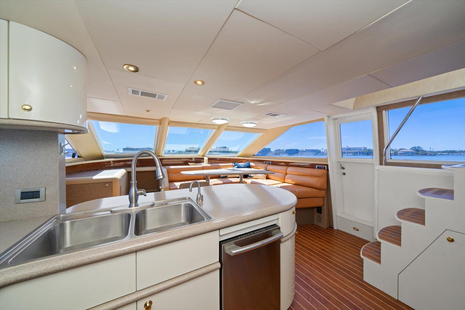 Lazzara-EB 76 1997-Octopi FL-US-Luxurious interior of 1997 Lazzara EB 76 yacht with modern kitchen and seating area.-9736767 | Thumbnail