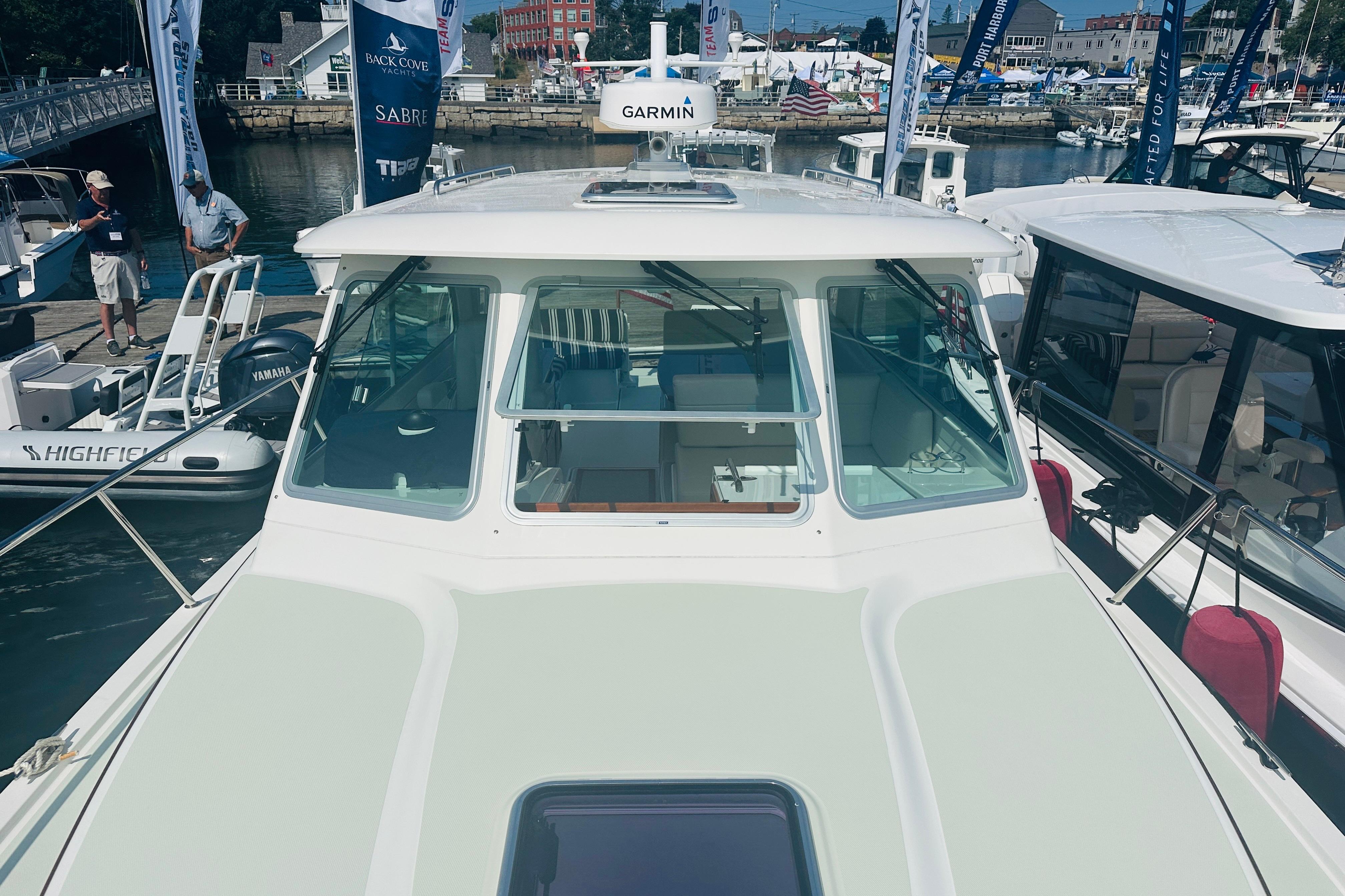 2017 Back Cove 32 boat docked at marina, featuring Garmin equipment and sleek design.