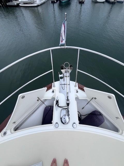 Bow view of 2021 Sabre 45 Salon Express yacht at dock.
