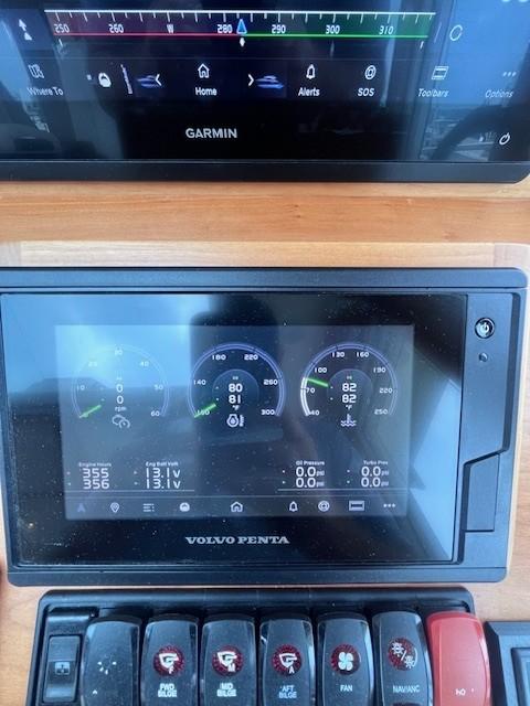 Control panel of a 2021 Sabre 45 Salon Express with Garmin and Volvo Penta displays.