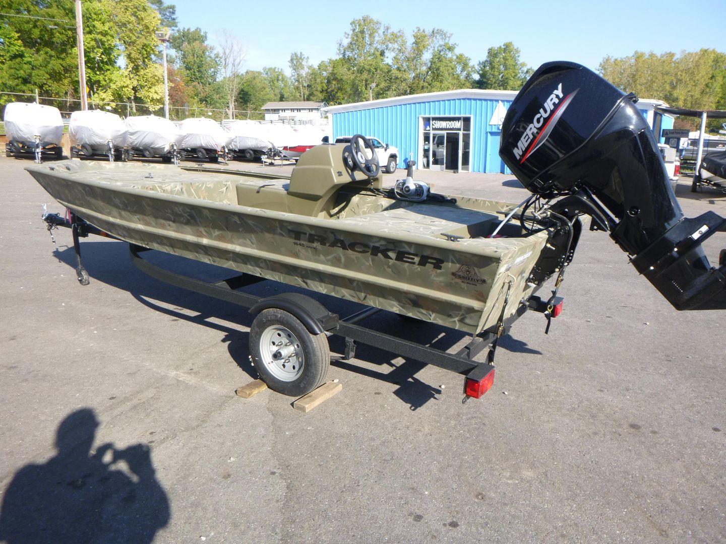 2024 Tracker Grizzly 1648 SC boat with Mercury engine on trailer.
