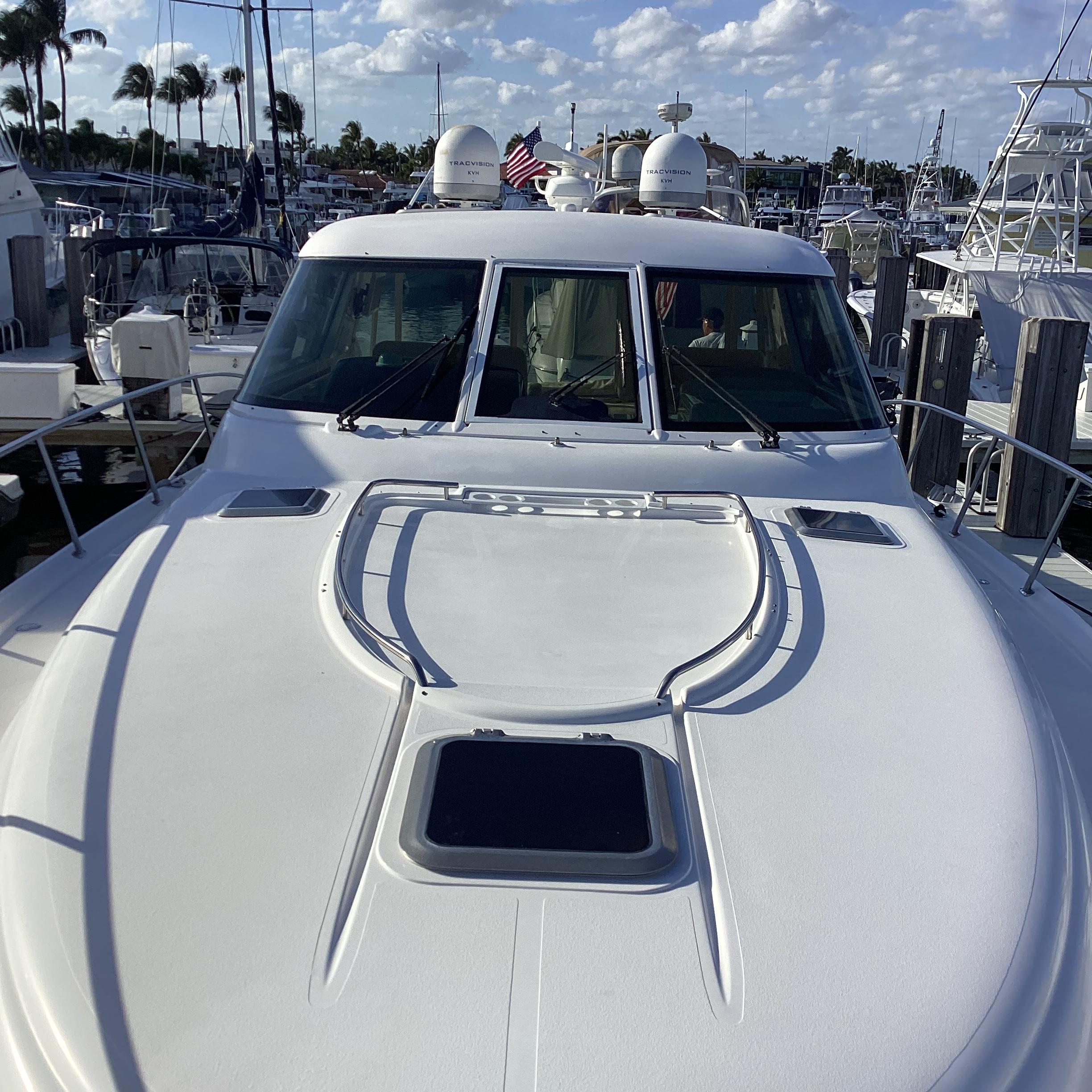 Tiara Yachts-4400 Sovran 2004-CC Rider FL-US-2004 Tiara Yachts 4400 Sovran docked at marina under blue sky.-9631623 | Thumbnail