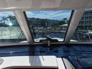 Tiara Yachts-4400 Sovran 2004-CC Rider FL-US-Interior view from 2004 Tiara Yachts 4400 Sovran, showcasing marina and palm trees.-9631623 | Thumbnail