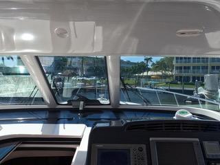 Tiara Yachts-4400 Sovran 2004-CC Rider FL-US-Interior view of 2004 Tiara Yachts 4400 Sovran helm with marina in background.-9631623 | Thumbnail