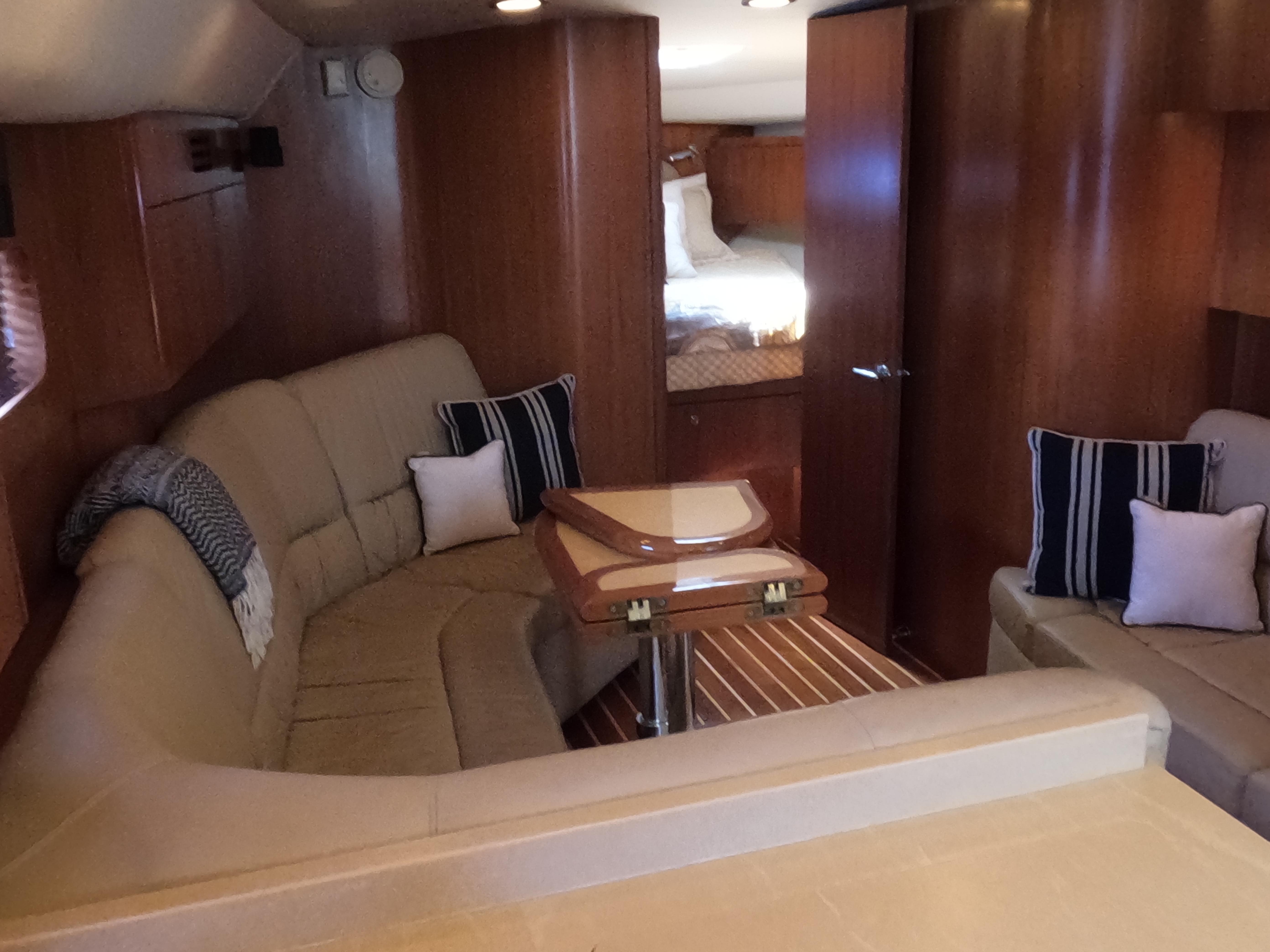 Tiara Yachts-4400 Sovran 2004-CC Rider FL-US-Luxurious interior of 2004 Tiara Yachts 4400 Sovran with cozy seating and elegant wood finishes.-9631623 | Thumbnail