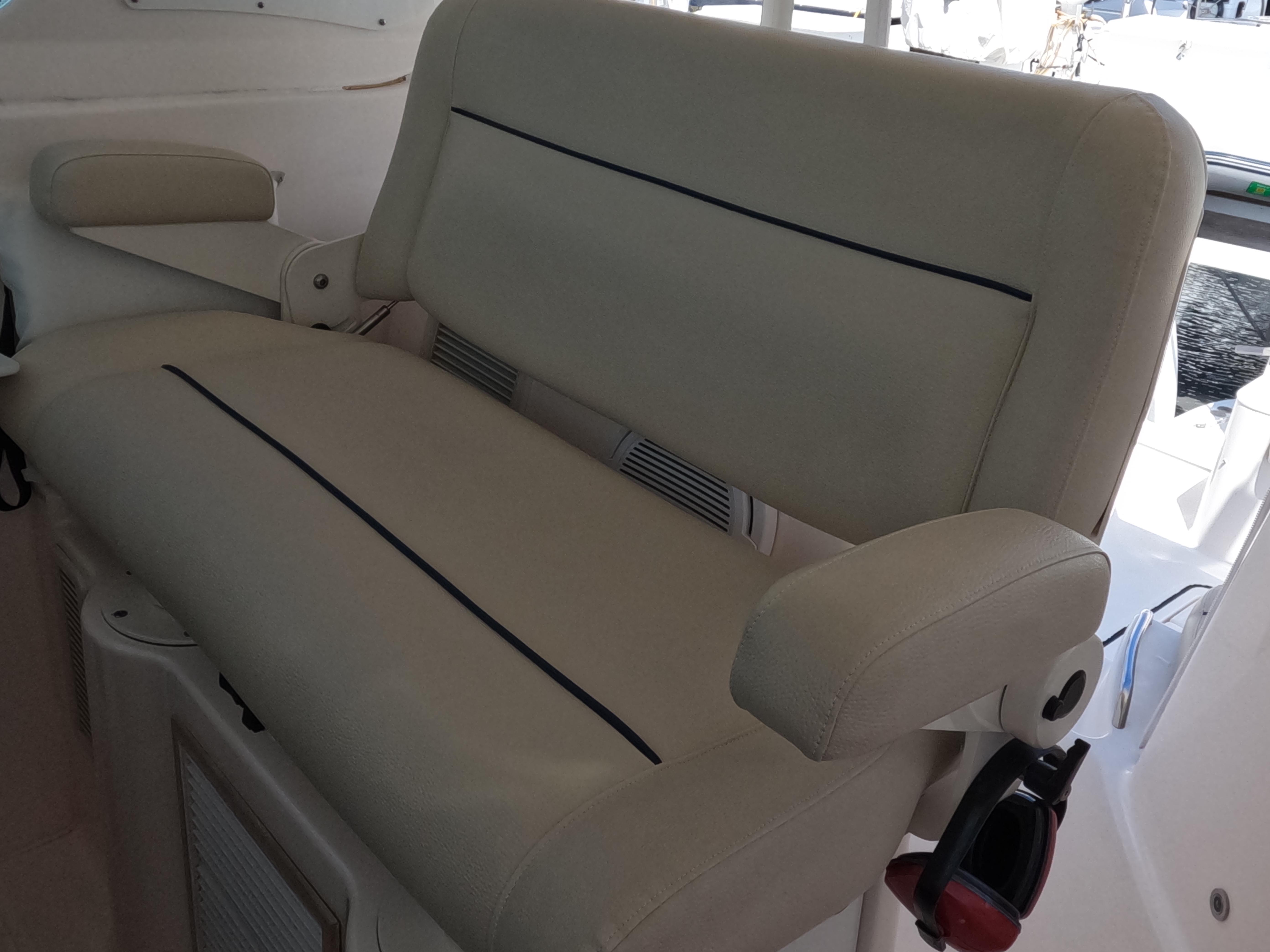Tiara Yachts-4400 Sovran 2004-CC Rider FL-US-2004 Tiara Yachts 4400 Sovran beige seating with armrests on deck.-9631623 | Thumbnail