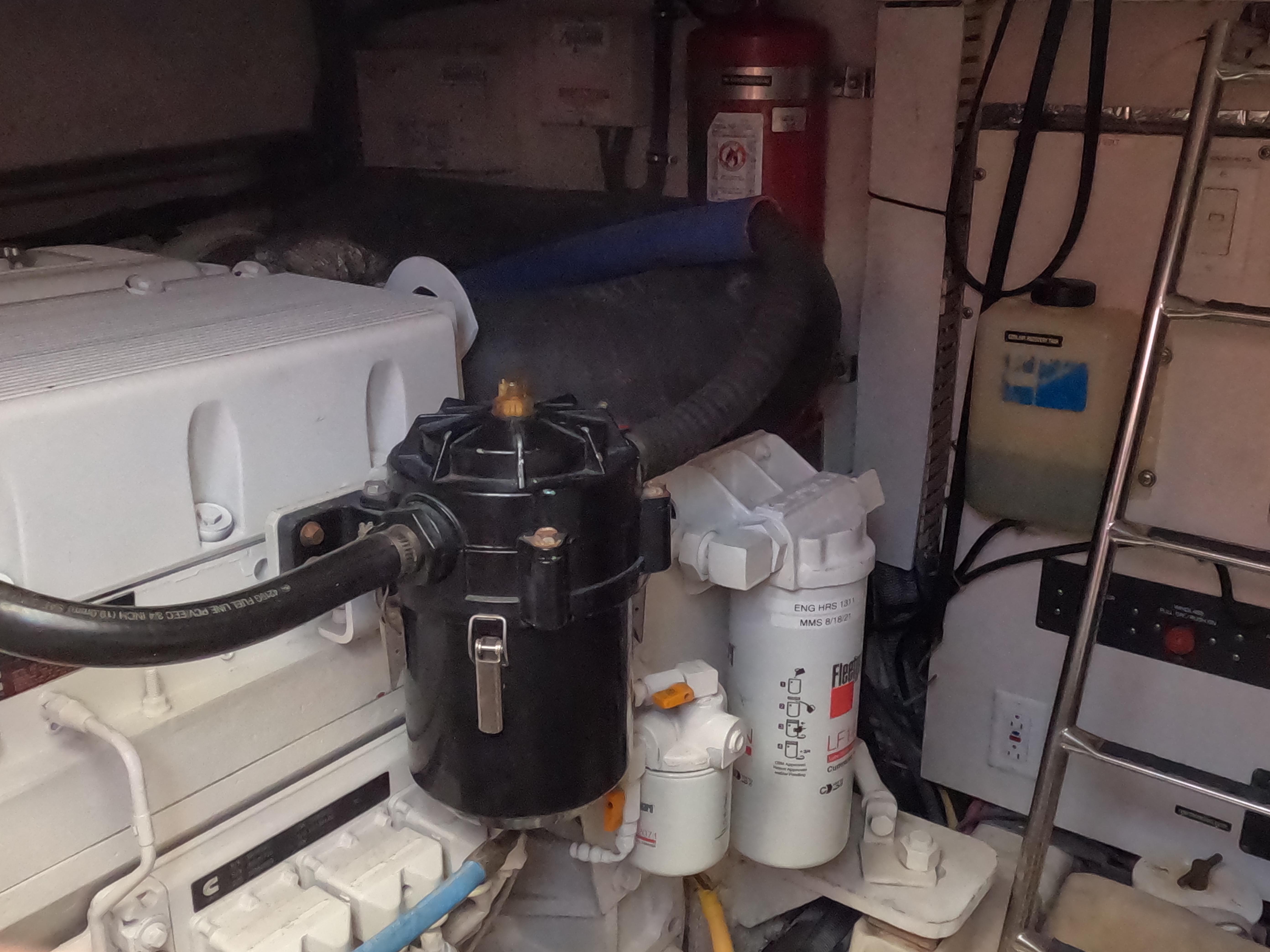 Tiara Yachts-4400 Sovran 2004-CC Rider FL-US-Engine room of 2004 Tiara Yachts 4400 Sovran with filters and equipment.-9631623 | Thumbnail