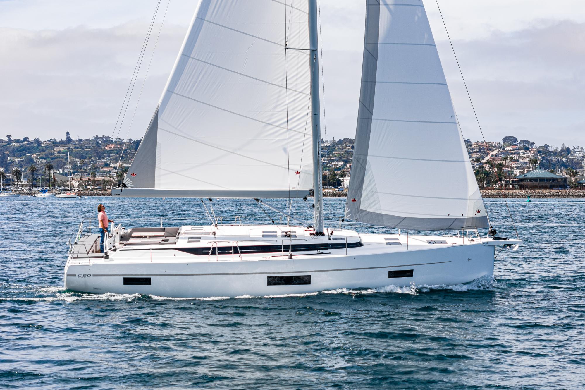 Bavaria-C50 2024-This could be yours CA-US-2024 Bavaria C50 sailboat cruising on open water, showcasing sleek design and white sails.-9654457 | Thumbnail