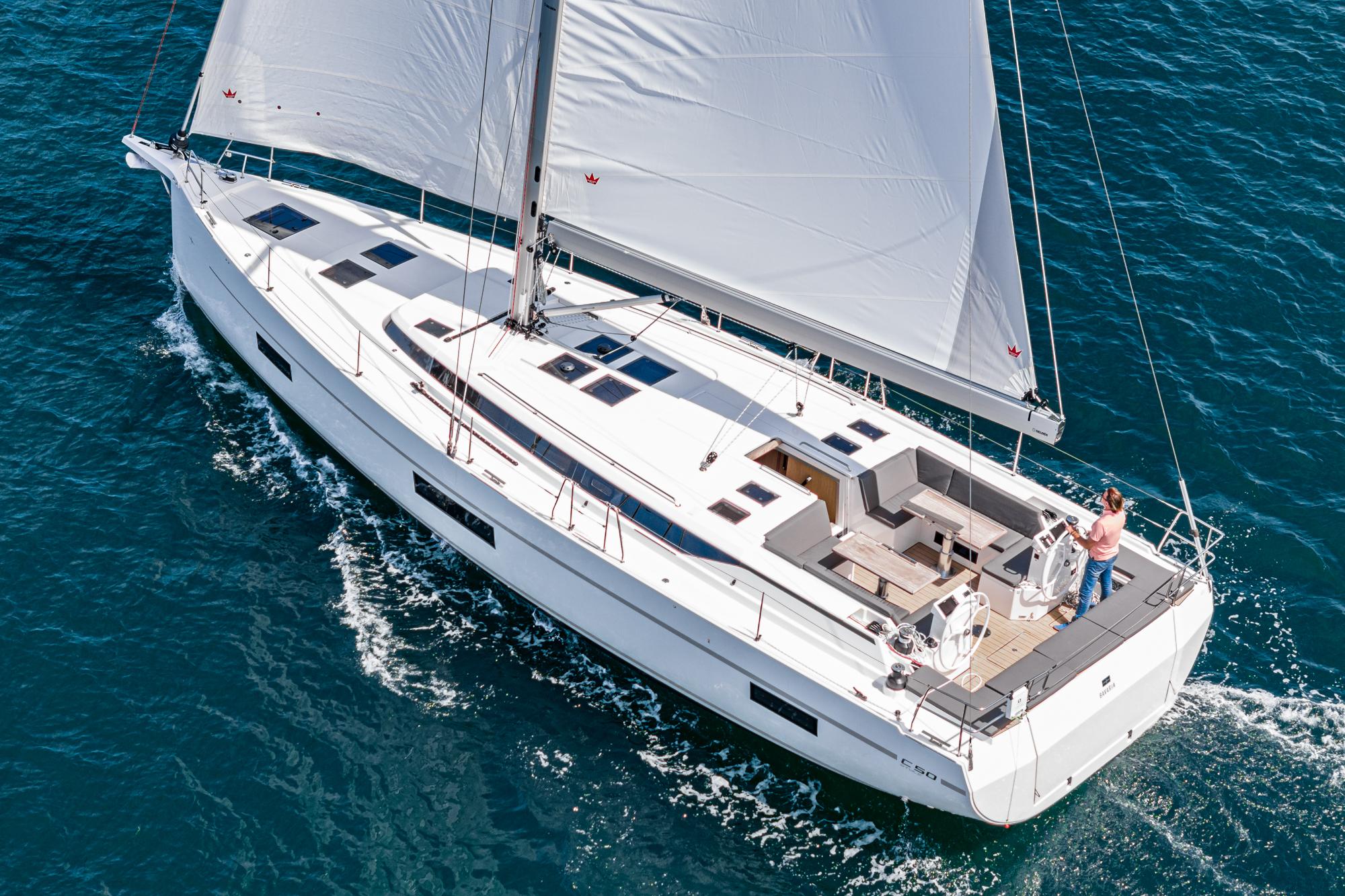 Bavaria-C50 2024-This could be yours CA-US-2024 Bavaria C50 yacht sailing on open water, showcasing sleek design and spacious deck.-9654457 | Thumbnail