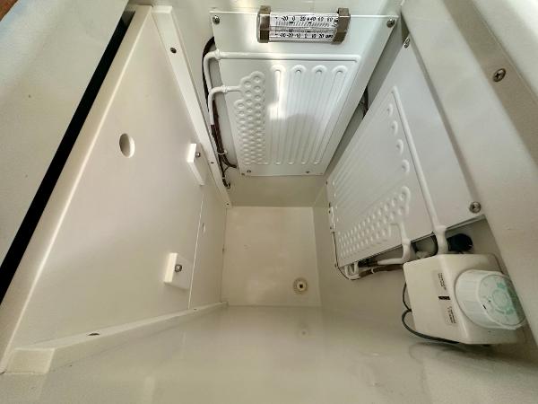 Interior view of a 1996 Valiant 39 refrigerator compartment with cooling elements.