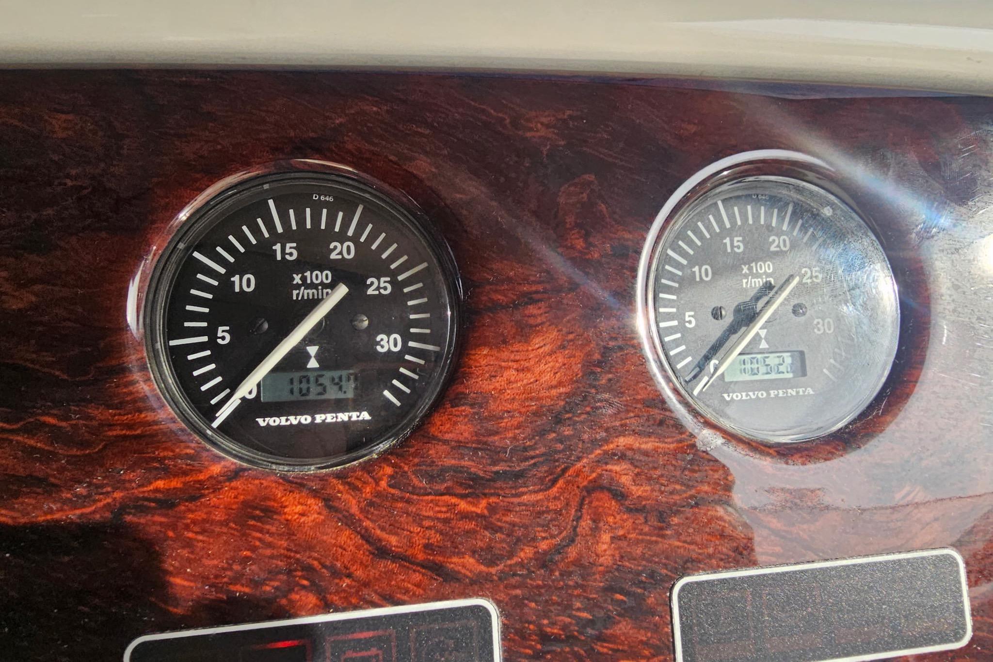 Volvo Penta gauges on 2003 Cranchi Atlantique 40 boat dashboard, displaying RPM readings.