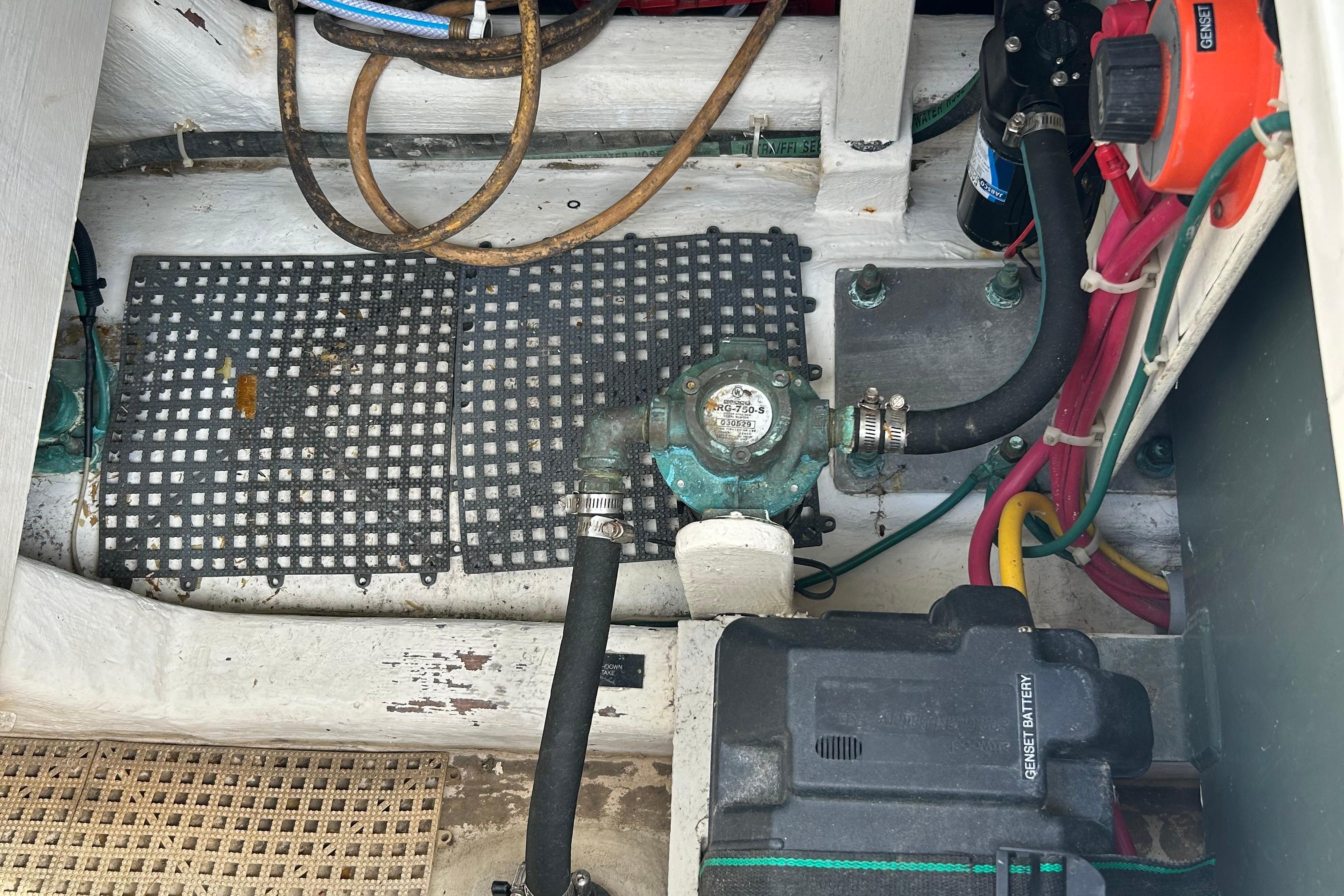 Engine compartment of 2004 Sabre 36 FB boat with visible wiring and components.