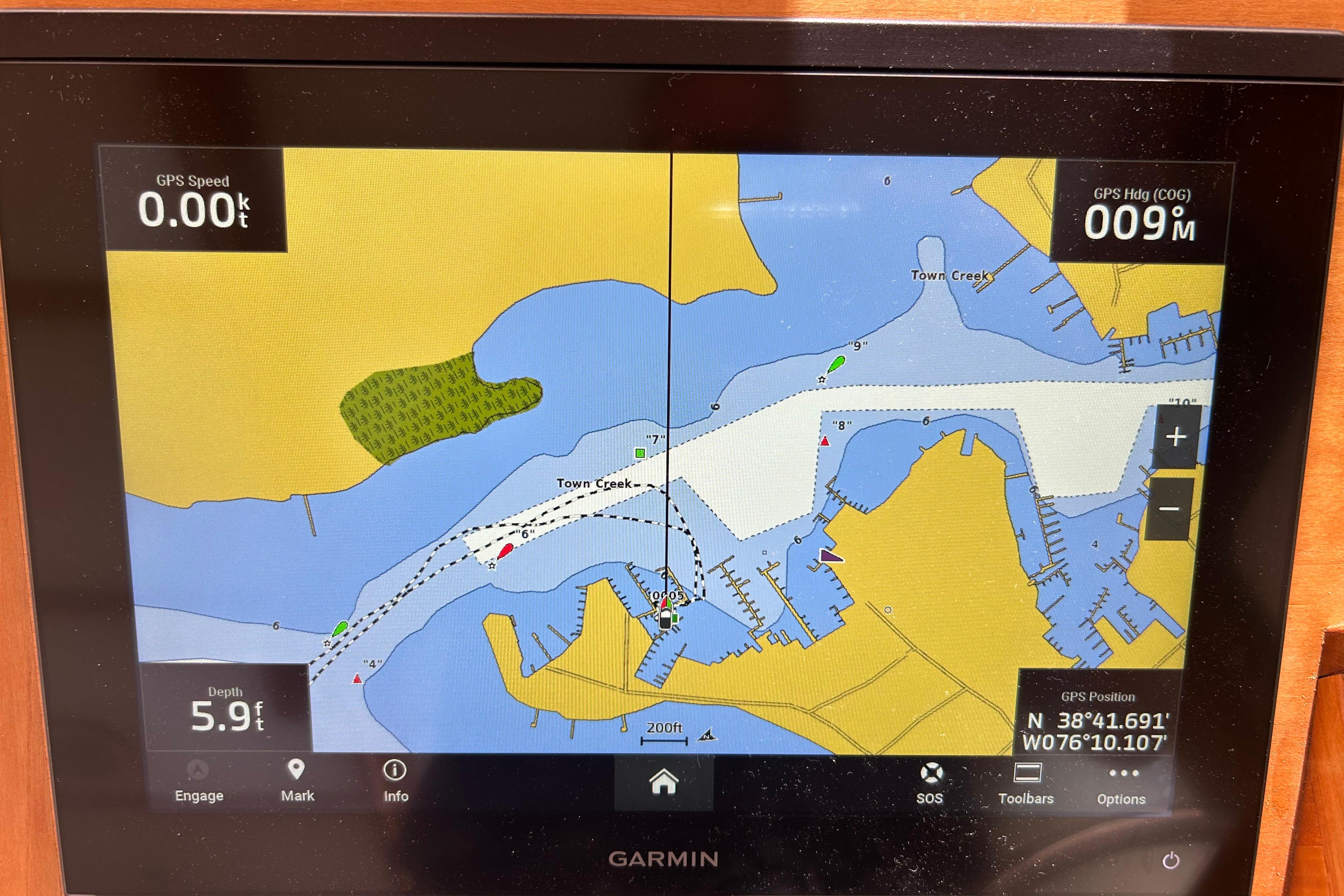 Garmin GPS display on 2004 Sabre 36 FB, showing nautical map and navigation data.