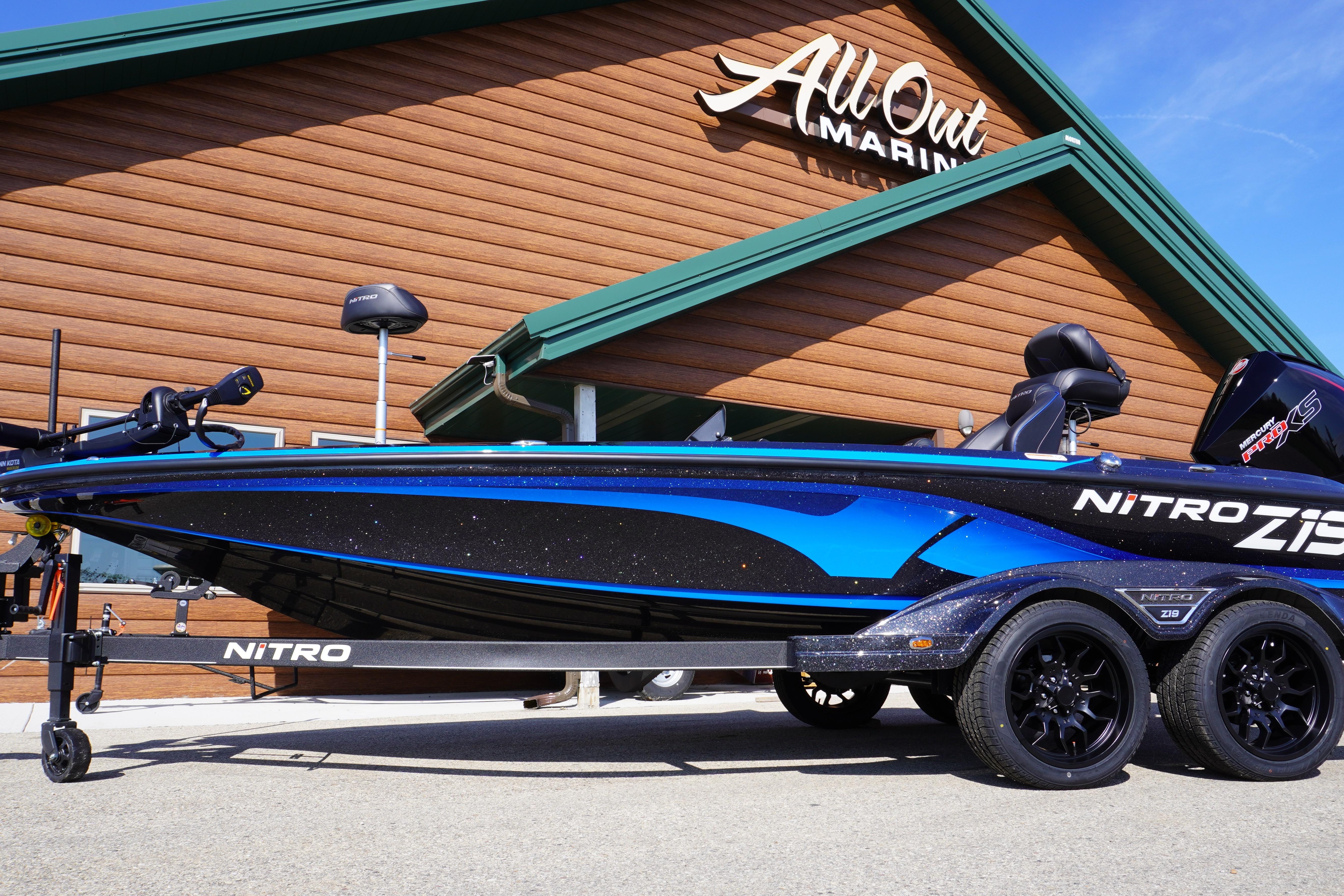 2024 Nitro Z19 boat at All Out Marine dealership, showcasing sleek design and vibrant blue accents.