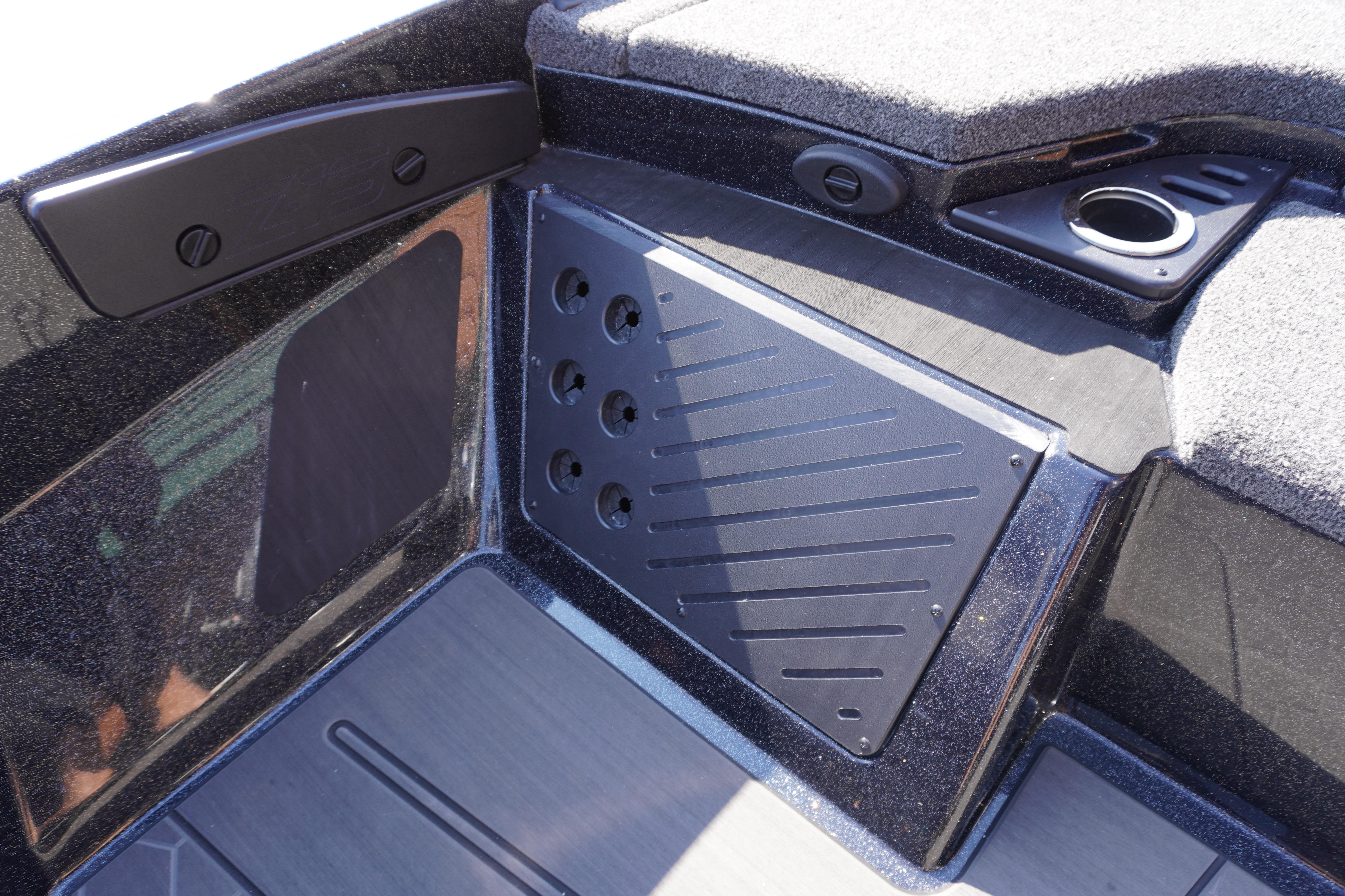 2024 Nitro Z19 boat interior with sleek black panel and cup holder.