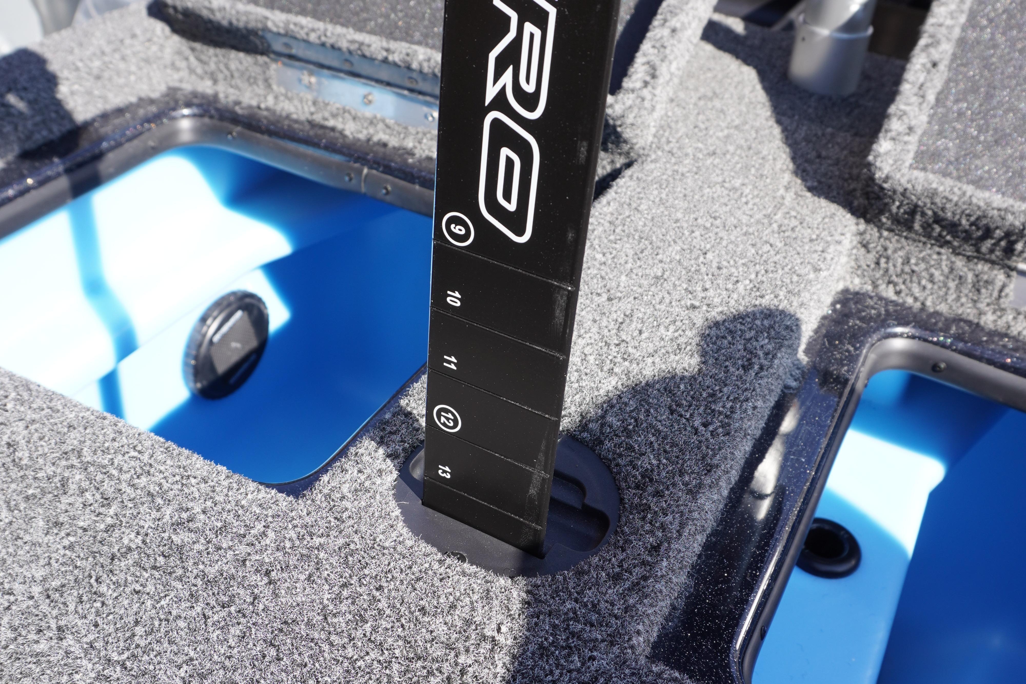 2024 Nitro Z19 boat interior with livewell and measuring stick.