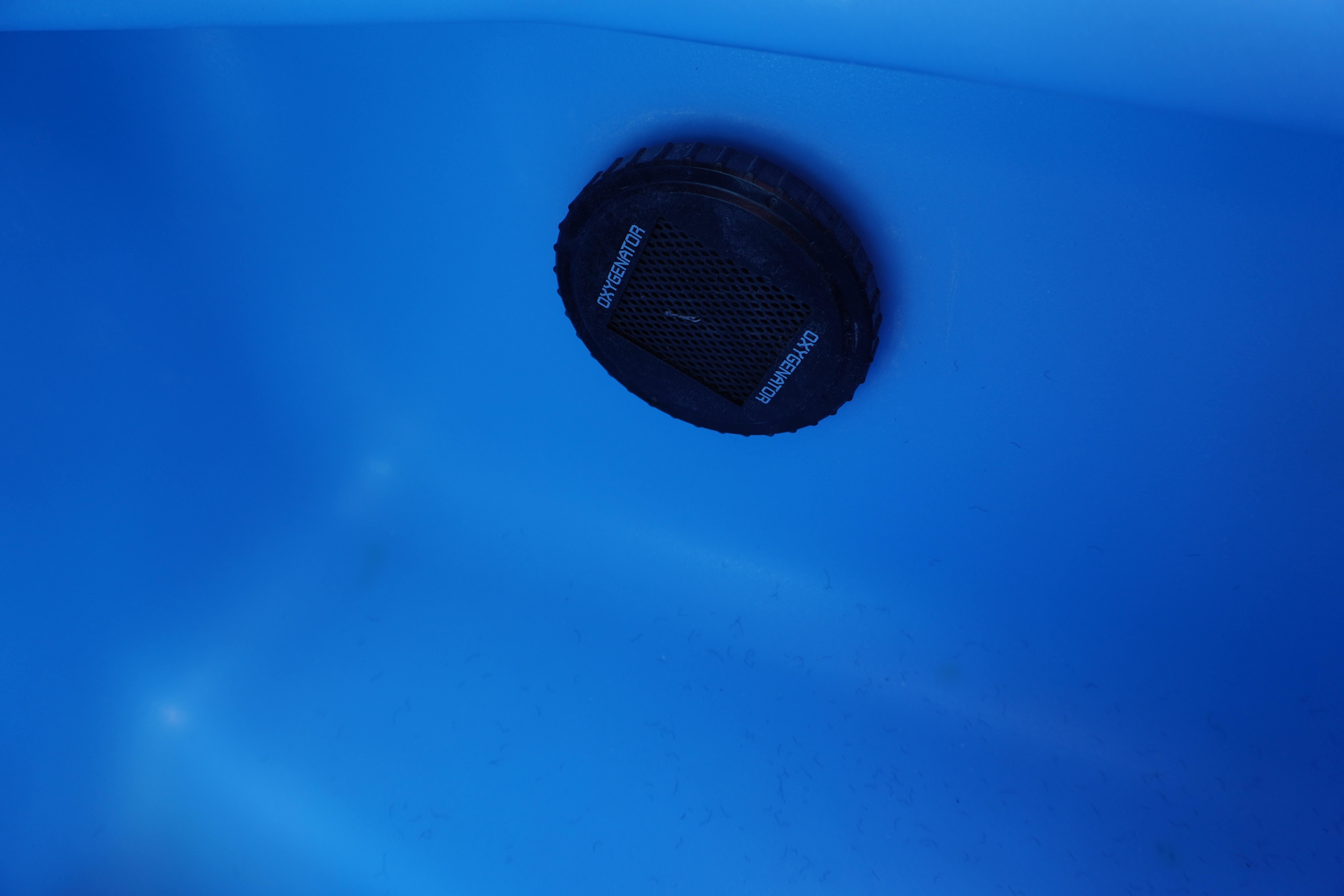 Close-up of a 2024 Nitro Z19 boat's oxygenator in a blue compartment.