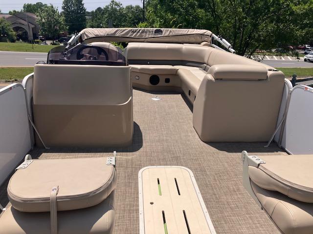 2020 G3 SunCatcher V322FC pontoon boat with beige seating and spacious deck.