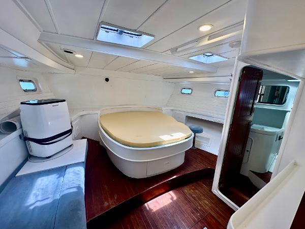 Interior of 1983 Tayana 55 yacht with modern furnishings and natural light.