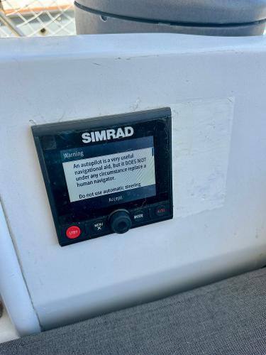Simrad autopilot warning display on 1983 Tayana 55 sailboat.