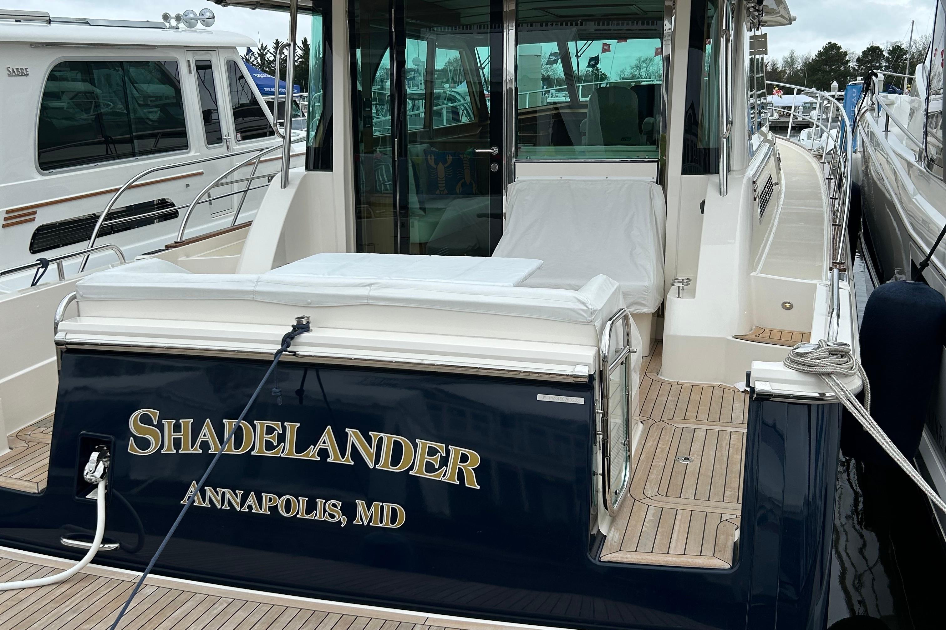 2022 Sabre 45 Salon Express yacht docked, featuring u0022Shadelanderu0022 from Annapolis, MD.