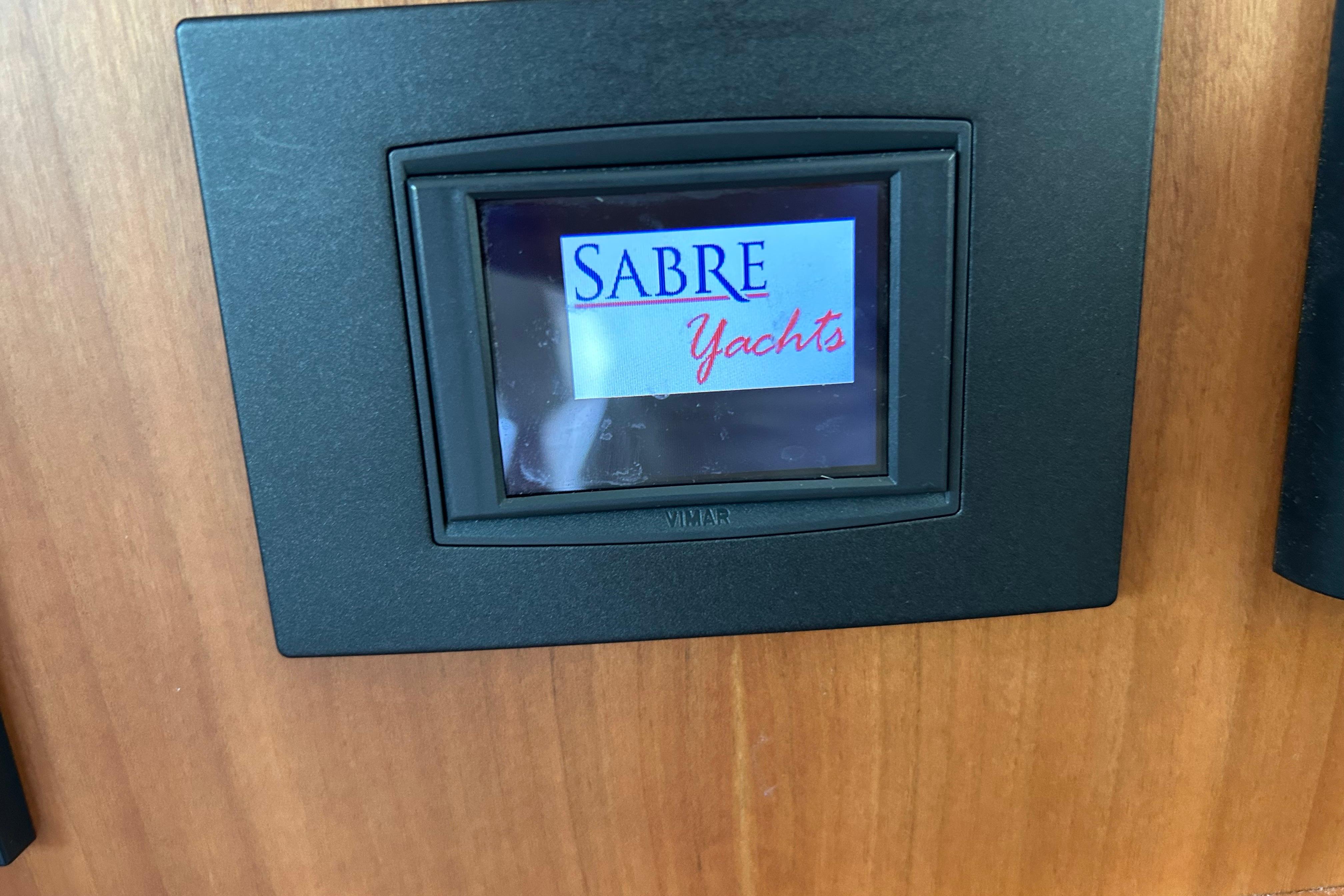 Display screen on 2022 Sabre 45 Salon Express yacht interior.