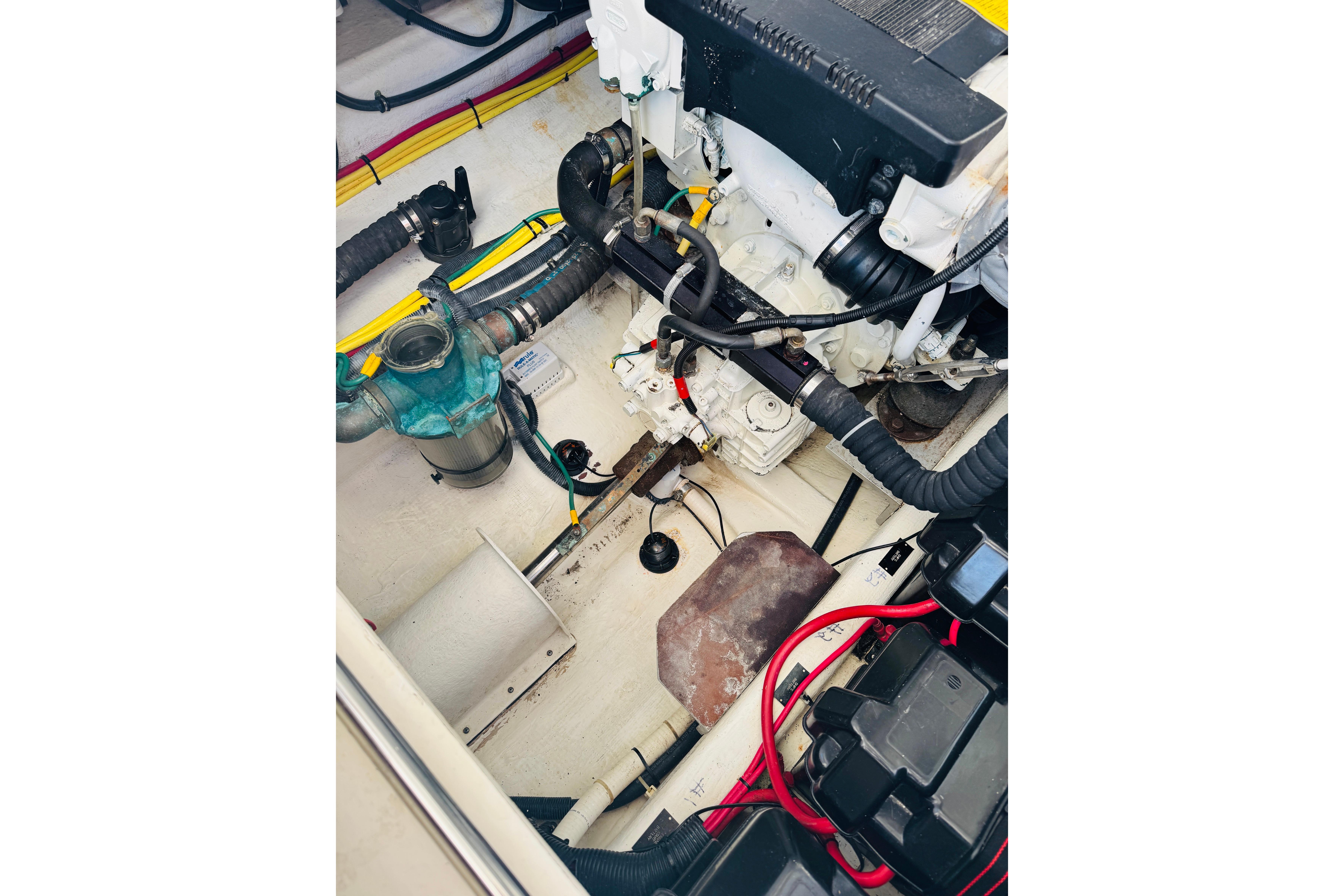 Engine compartment of a 2007 Back Cove 29 boat, showcasing mechanical components.