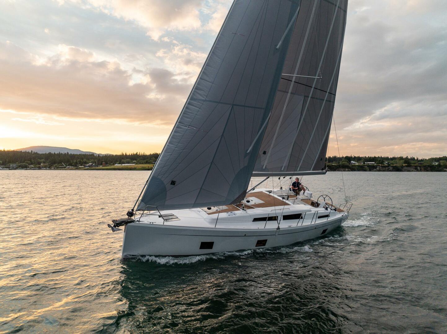 Hanse-418 2023-SEA #304 IN STOCK WA-US-2023 Hanse 418 sailboat cruising at sunset on open water.-9568627