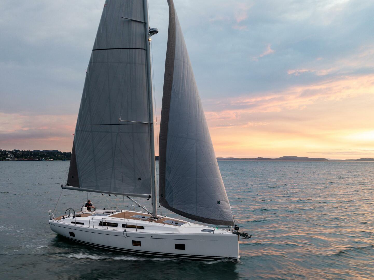 Hanse-418 2023-SEA #304 IN STOCK WA-US-2023 Hanse 418 sailboat cruising at sunset on open water.-9568627 | Thumbnail