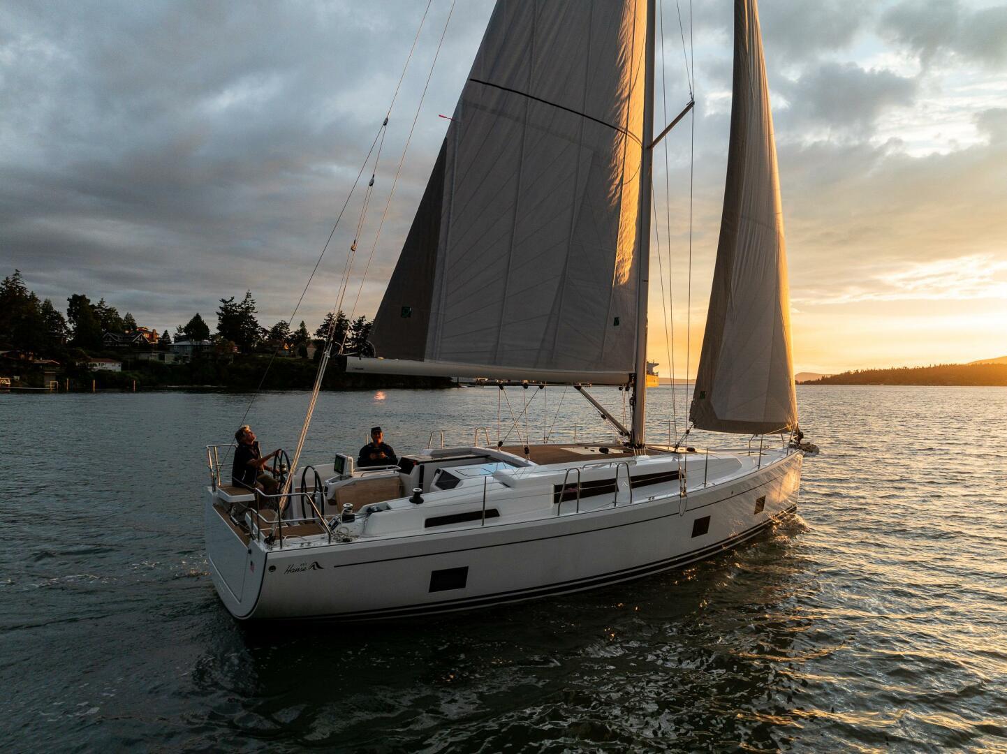 Hanse-418 2023-SEA #304 IN STOCK WA-US-Sailing yacht Hanse 418, 2023 model, cruising at sunset on calm waters.-9568627 | Thumbnail