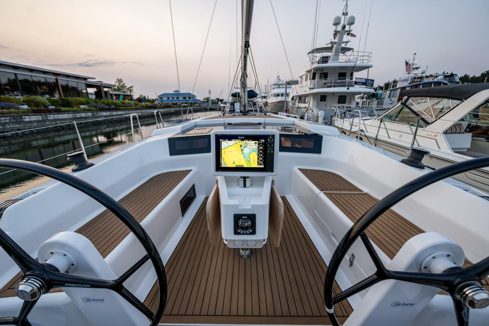 Hanse-418 2023-SEA #304 IN STOCK WA-US-Modern 2023 Hanse 418 yacht cockpit with dual steering wheels and navigation display.-9568627 | Thumbnail