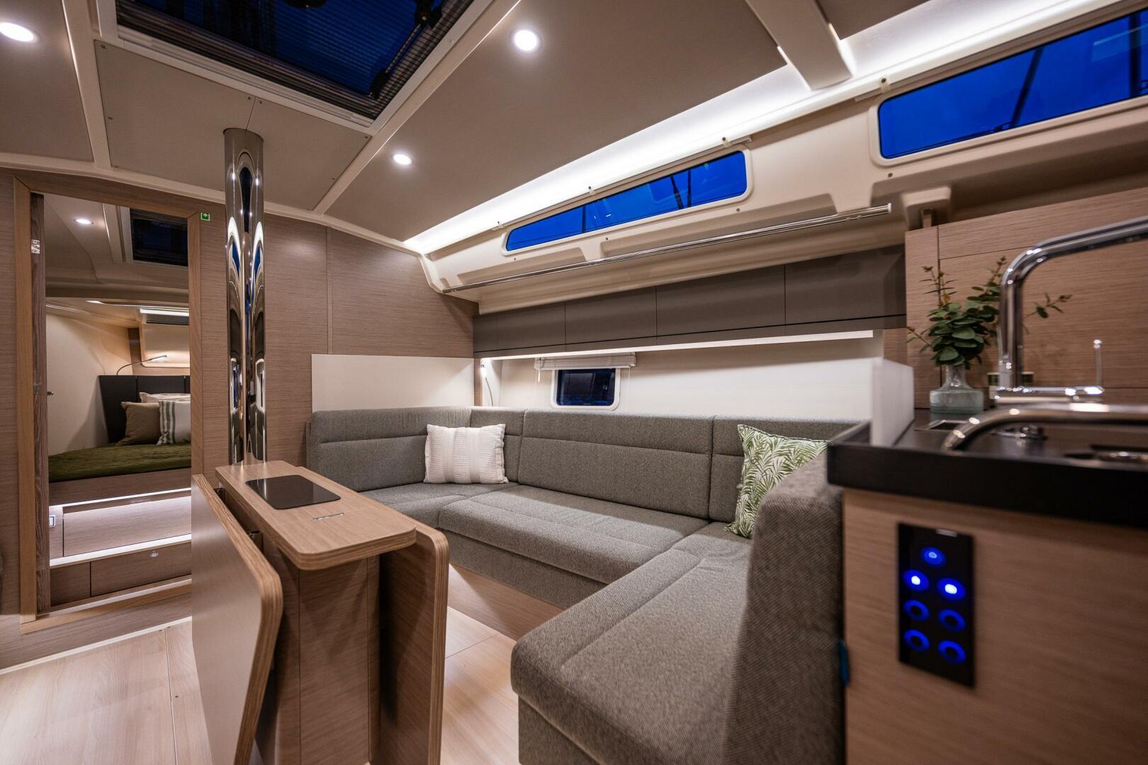 Hanse-418 2023-SEA #304 IN STOCK WA-US-Luxurious interior of 2023 Hanse 418 yacht with modern design and cozy seating area.-9568627 | Thumbnail