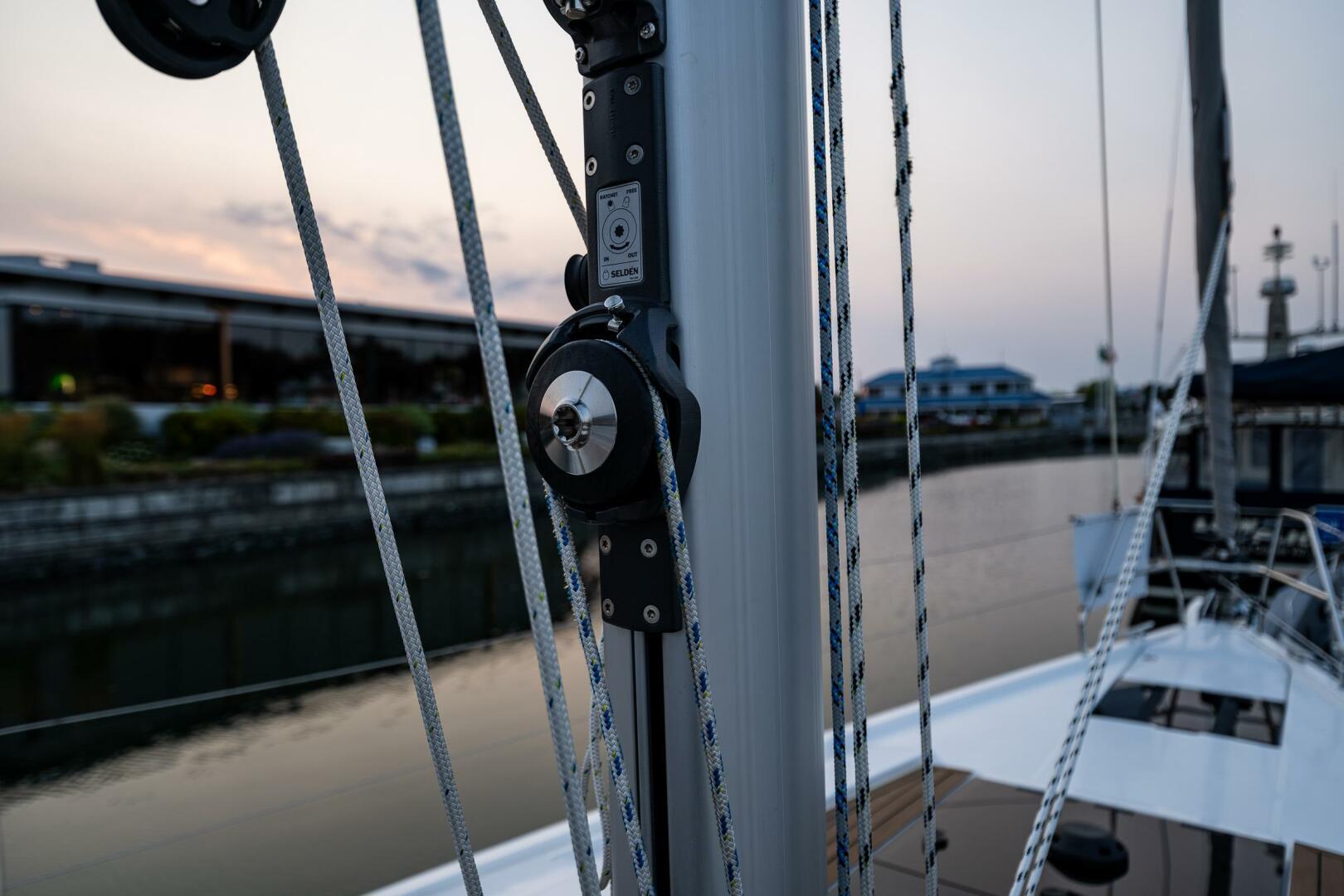 Hanse-418 2023-SEA #304 IN STOCK WA-US-Close-up of 2023 Hanse 418 sailboat rigging at sunset by a calm waterfront.-9568627 | Thumbnail