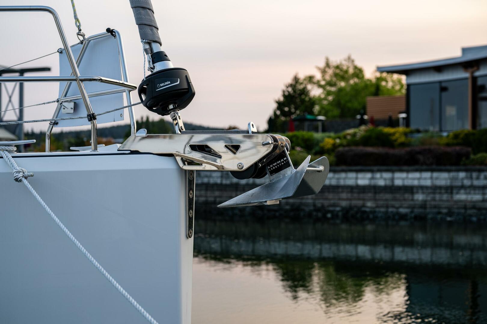 Hanse-418 2023-SEA #304 IN STOCK WA-US-Hanse 418 yacht anchor detail, 2023 model, docked by calm waters at sunset.-9568627 | Thumbnail