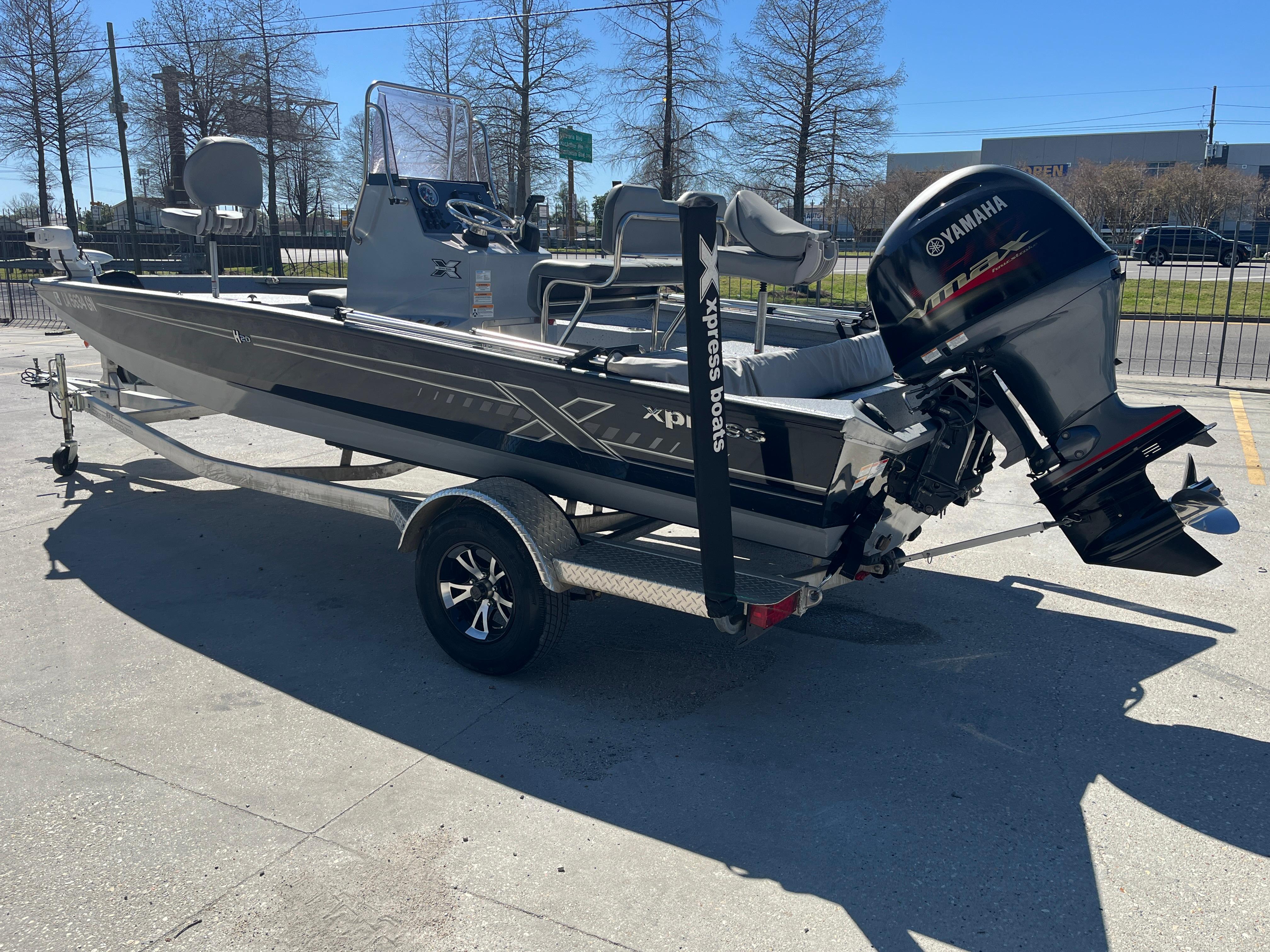 2022 Xpress H20B Bay Boat with Yamaha outboard engine on trailer.