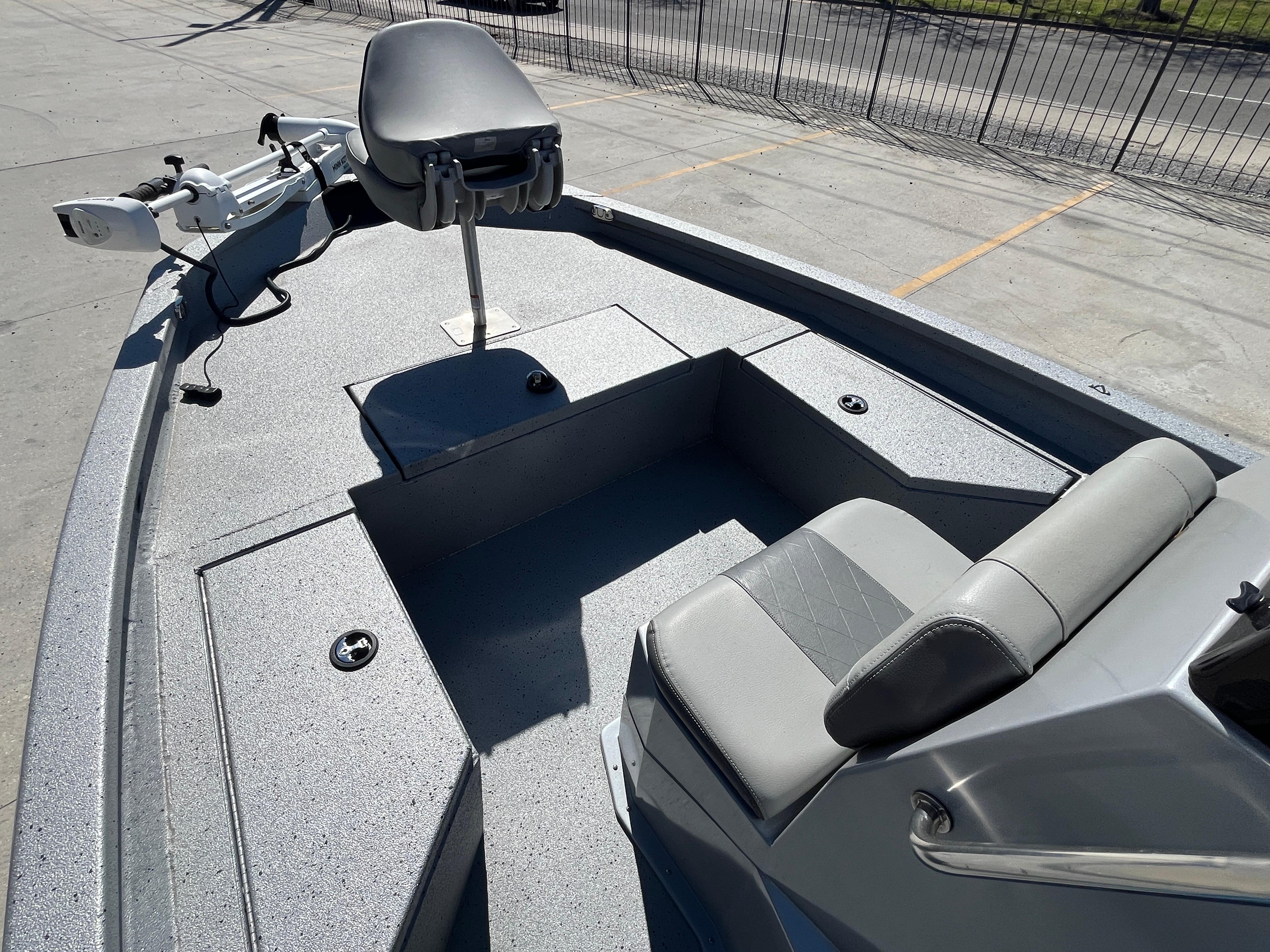2022 Xpress H20B Bay Boat interior with seating and trolling motor.