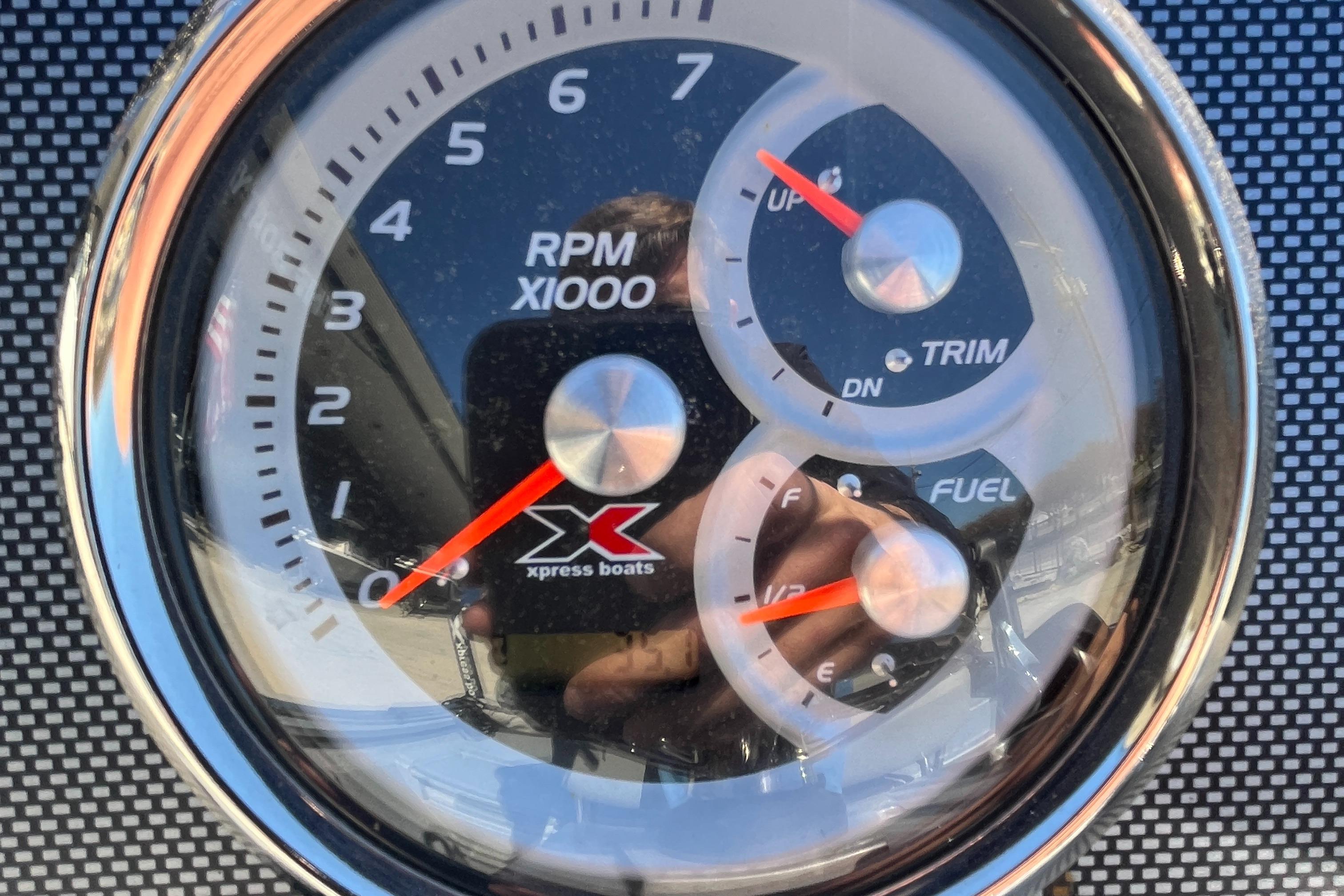 Tachometer and gauges on 2022 Xpress H20B Bay Boat dashboard.