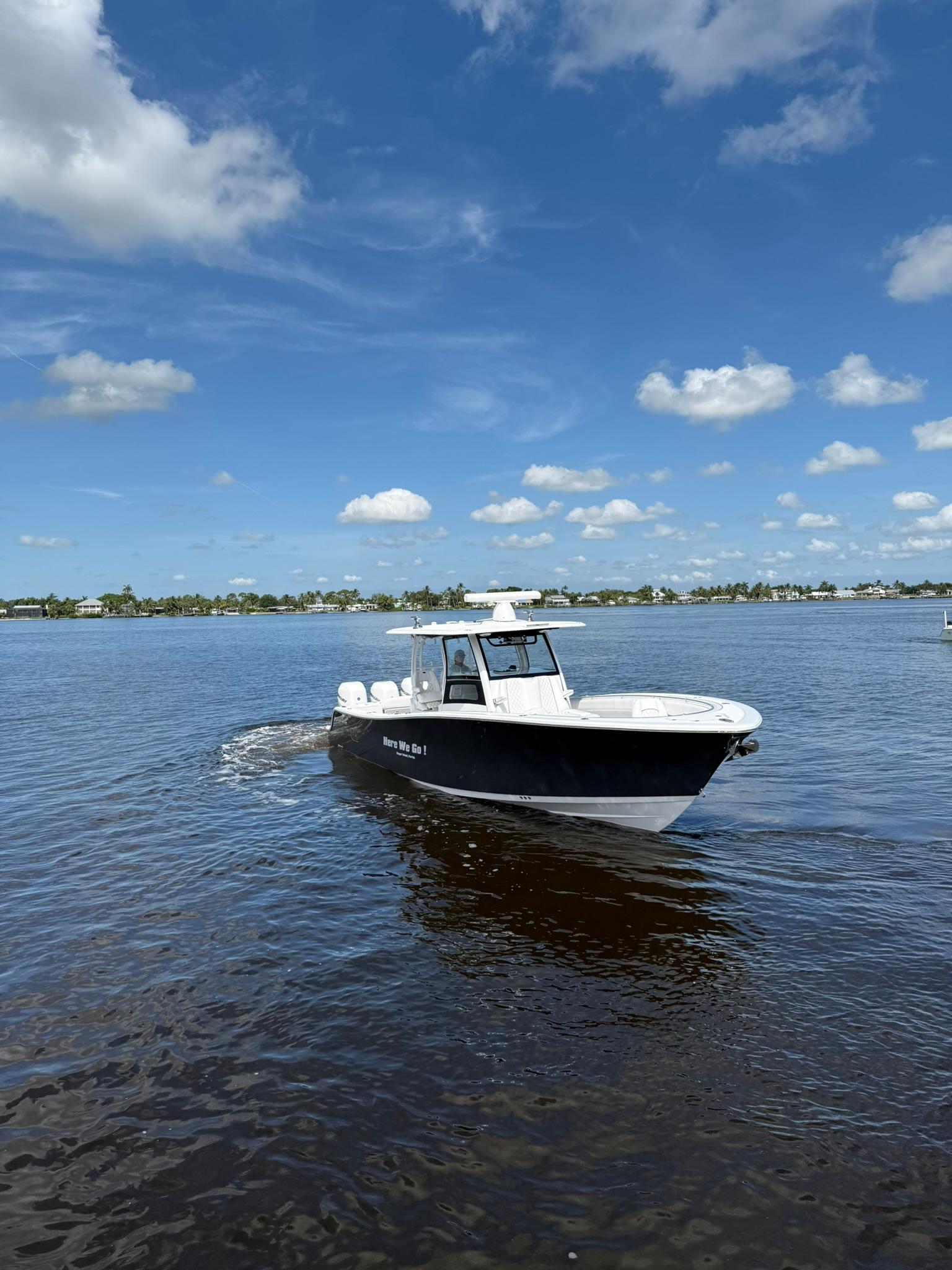 Sportsman-Open 352 Center Console 2021-Here We Go FL-US-2021 Sportsman Open 352 Center Console boat cruising on a sunny day.-9850725 | Thumbnail