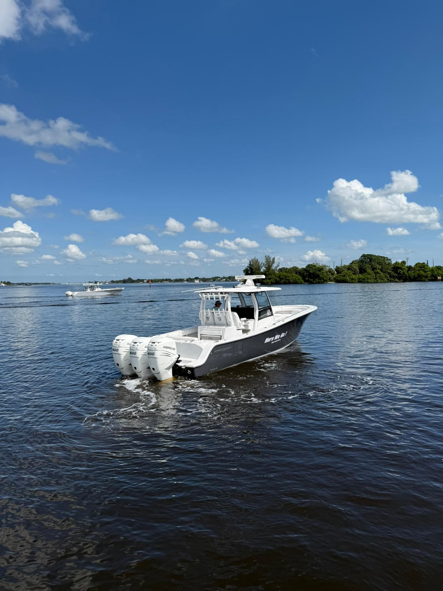 Sportsman-Open 352 Center Console 2021-Here We Go FL-US-2021 Sportsman Open 352 Center Console boat cruising on a sunny day.-9850725 | Thumbnail