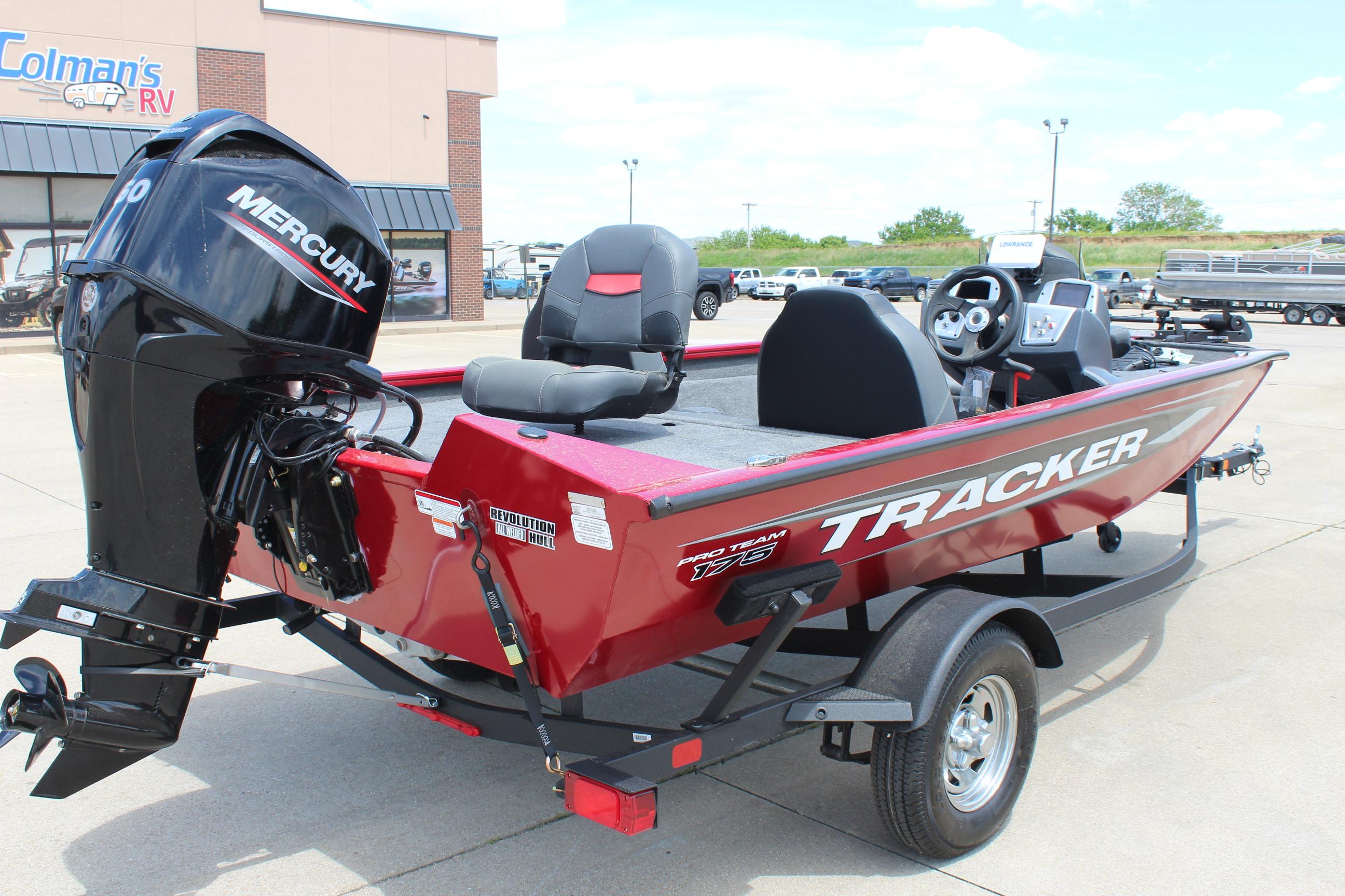 2025 Tracker Pro Team 175 boat with Mercury engine, parked outdoors.
