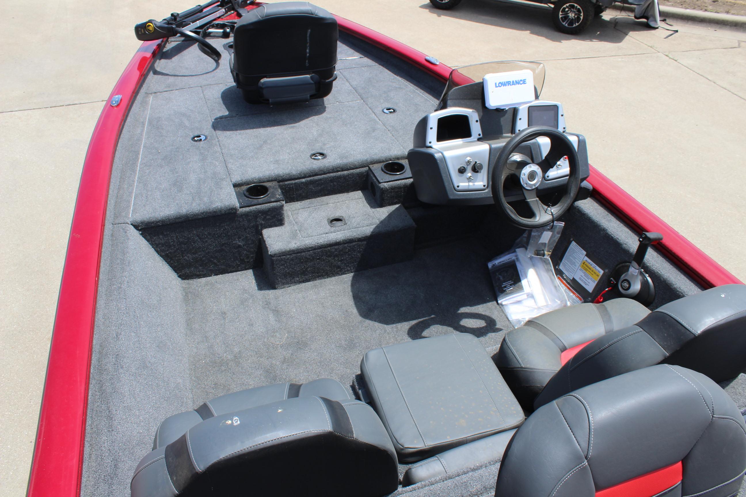 2025 Tracker Pro Team 175 boat interior with steering console and seating.