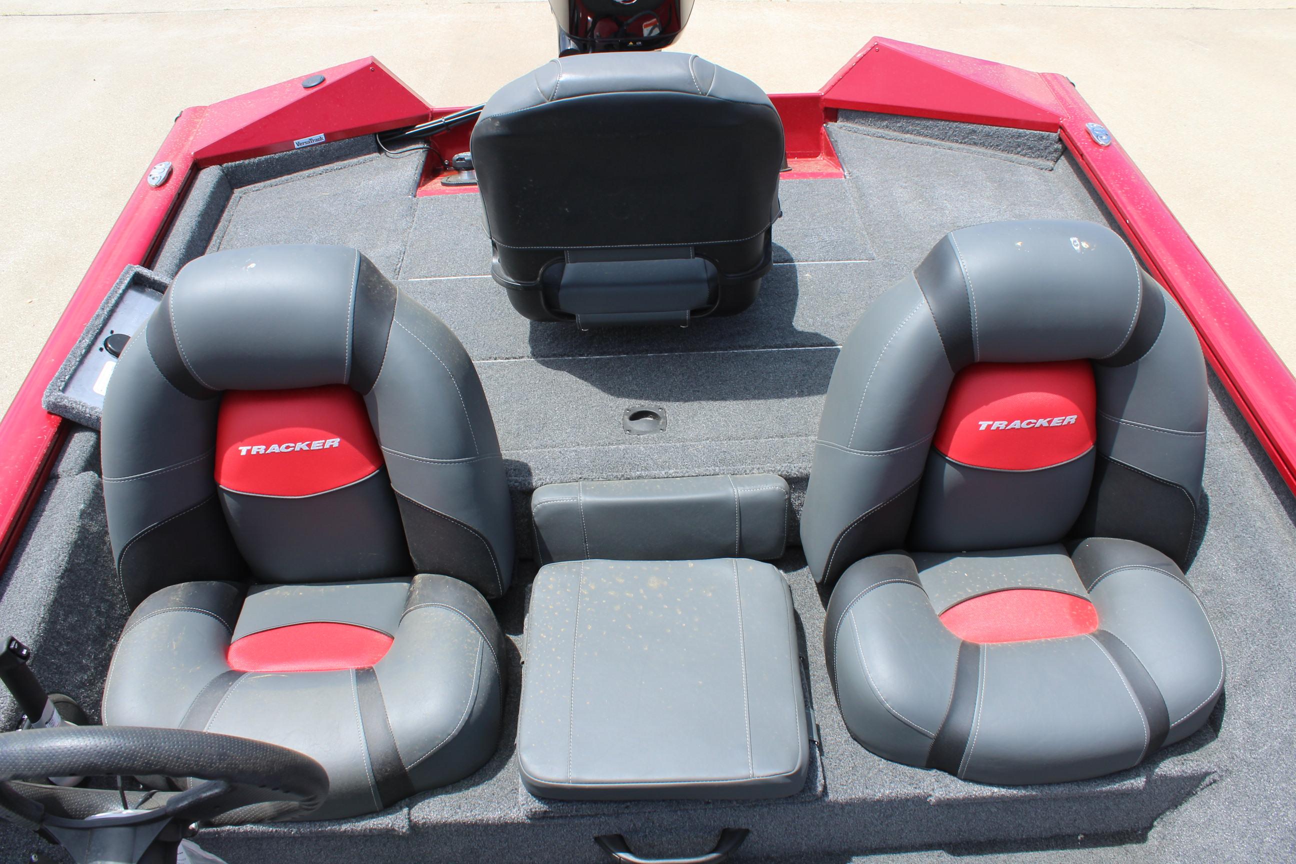 2025 Tracker Pro Team 175 boat interior with gray and red seating.