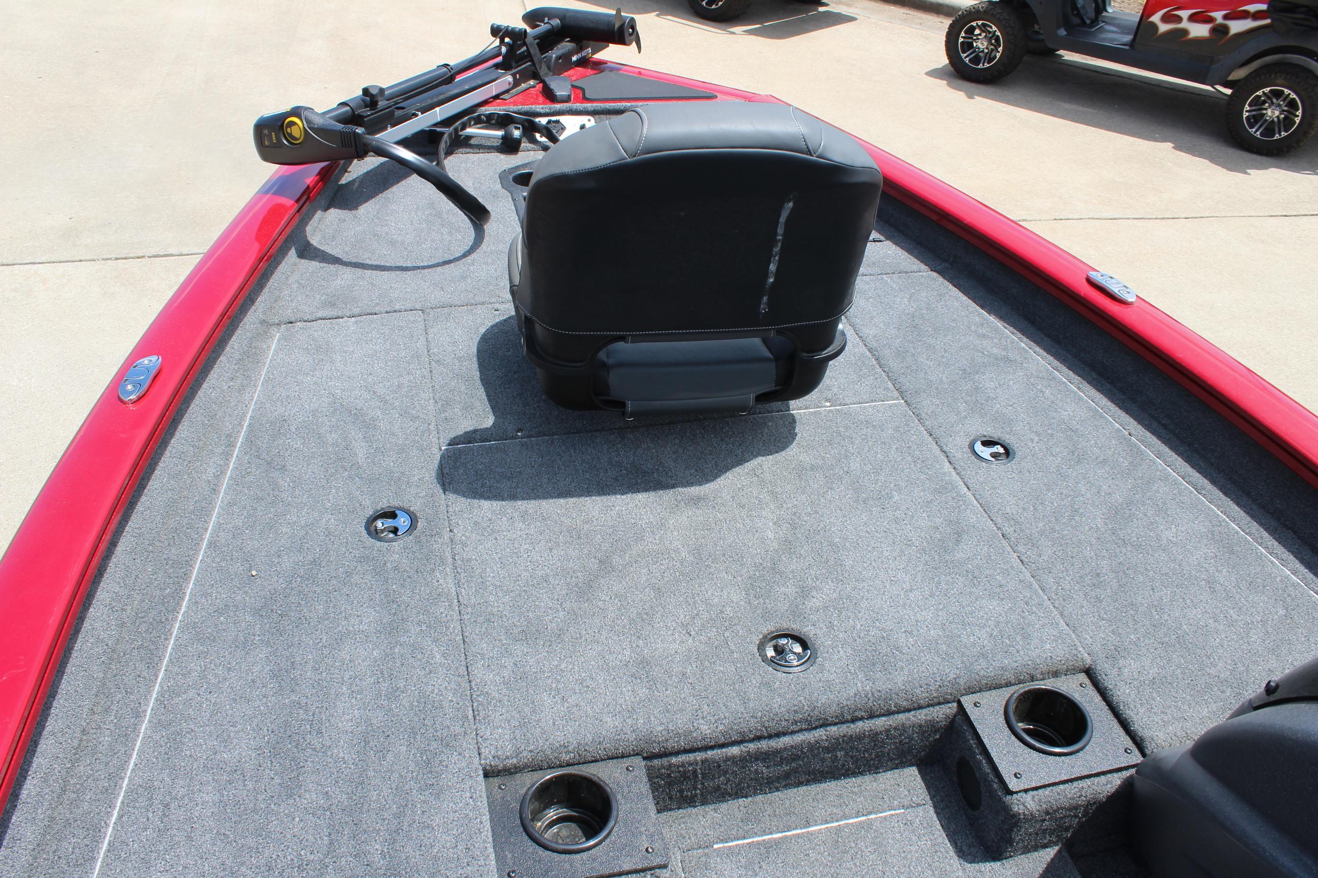 2025 Tracker Pro Team 175 boat deck with seating and fishing rod holders.
