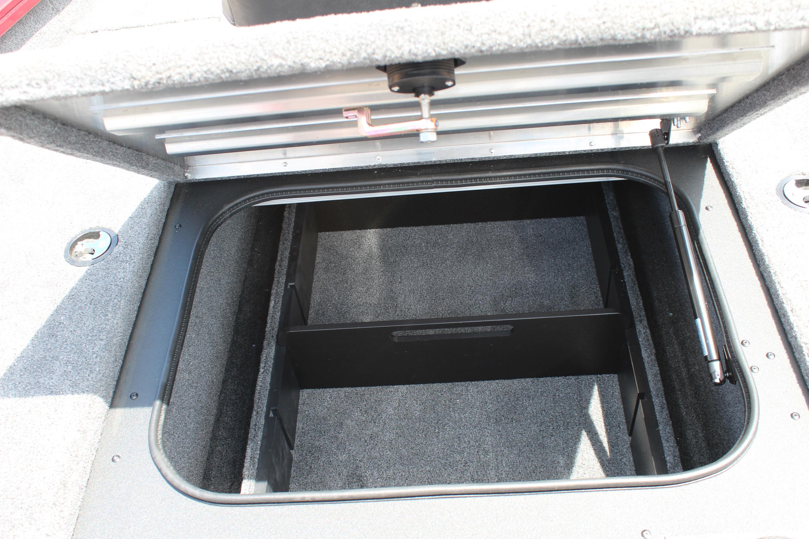 Open storage compartment in 2025 Tracker Pro Team 175 boat.