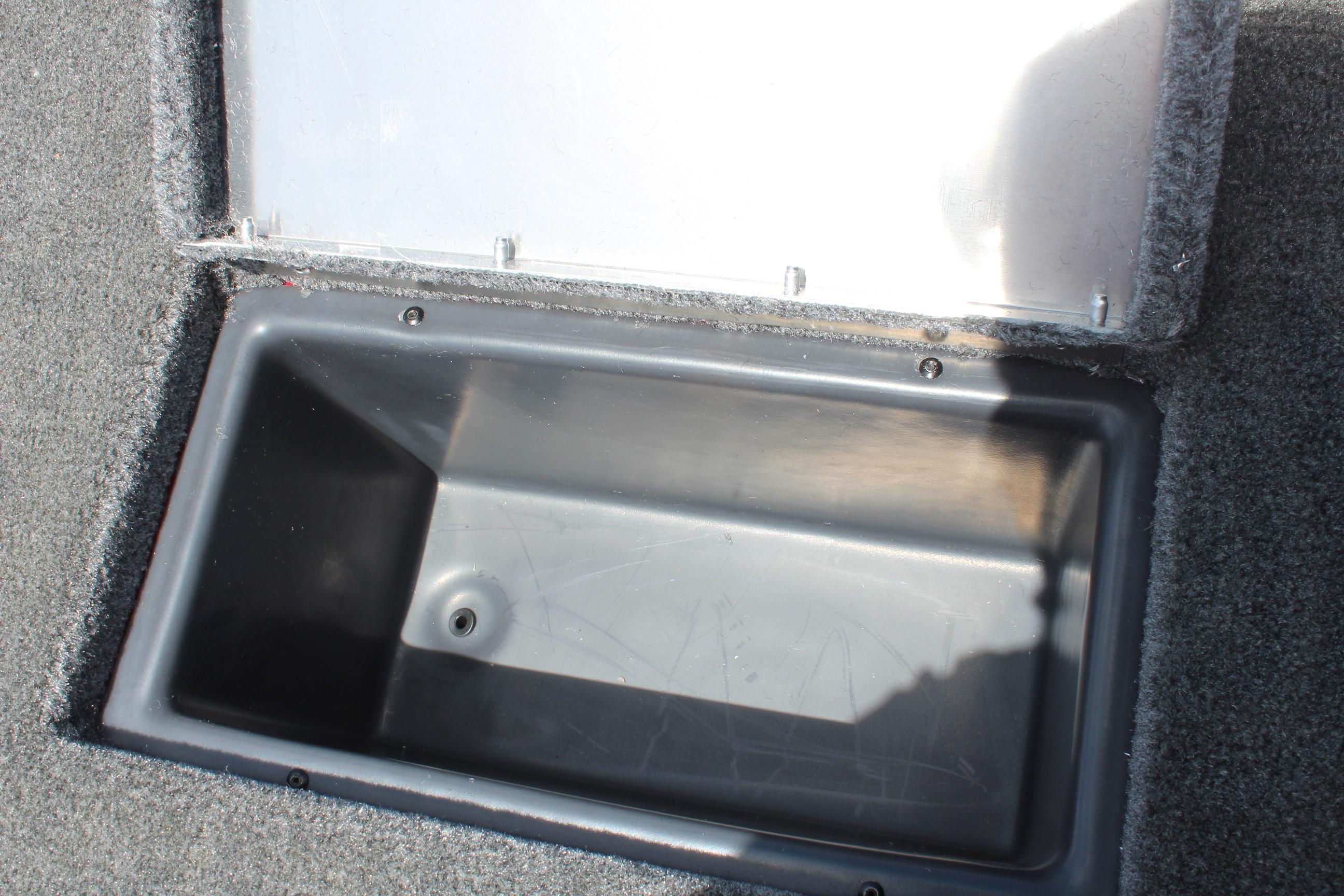 Open storage compartment in 2025 Tracker Pro Team 175 boat.